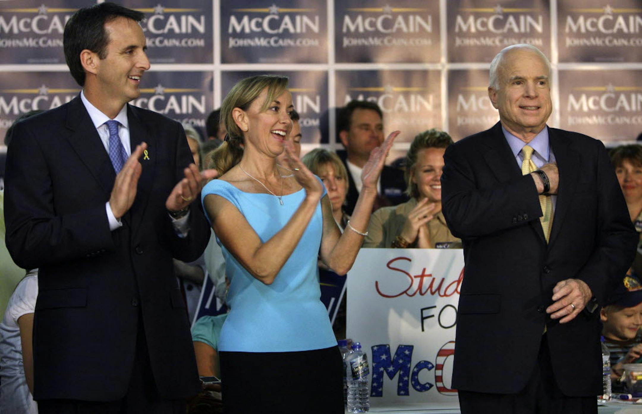 In this July 10 photo, Minnesota Gov. Tim Pawlenty and his wife, Mary, applaud as Republican presidential candidate Sen. John McCain is introduced at his Minnesota campaign headquarters in St. Paul.