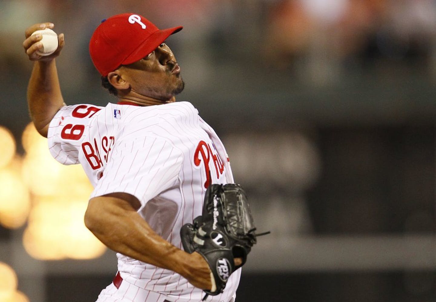 Philadelphia Phillies' Antonio Bastardo delivers during a baseball game with the Atlanta Braves, Friday, July 5, 2013, in Philadelphia. (AP Photo/Tom Mihalek) ORG XMIT: MIN2013080518060357