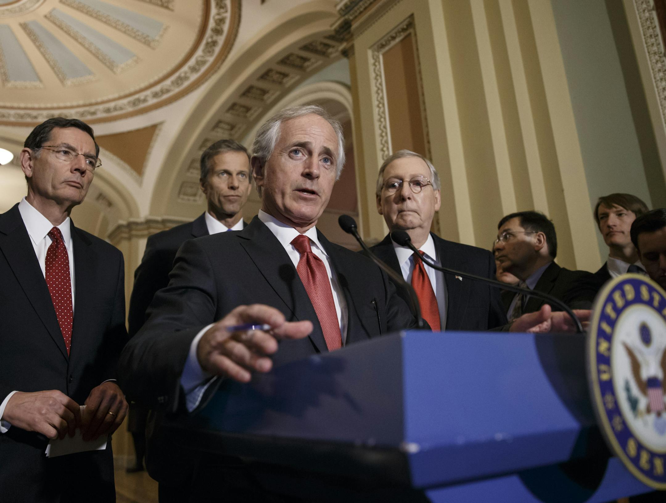Senate Foreign Relations Committee Chairman Bob Corker, R-Tenn., outlines his bipartisan bill requiring congressional review of any comprehensive nuclear agreement that President Barack Obama reaches with Iran, at the Capitol in Washington, Tuesday, March 3, 2015. He is joined at rear, from left, by, Sen. John Barrasso, R-Wyo., Sen. John Thune, R-S.D., and Senate Majority Leader Mitch McConnell, R-Ky. The senators had just heard Israeli Prime Minister Benjamin Netanyahu's concerns about Iran's n