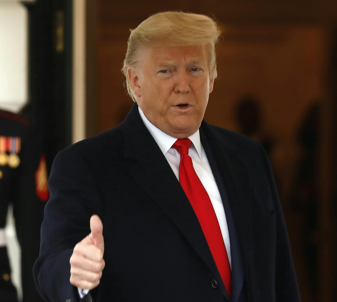 U.S. President Donald Trump thumbs up to the media at the White House in Washington one hour before a Senate final vote on the impeachment trial on February 5, 2020. (Yuri Gripas/Abaca Press/TNS) ORG XMIT: 1564016