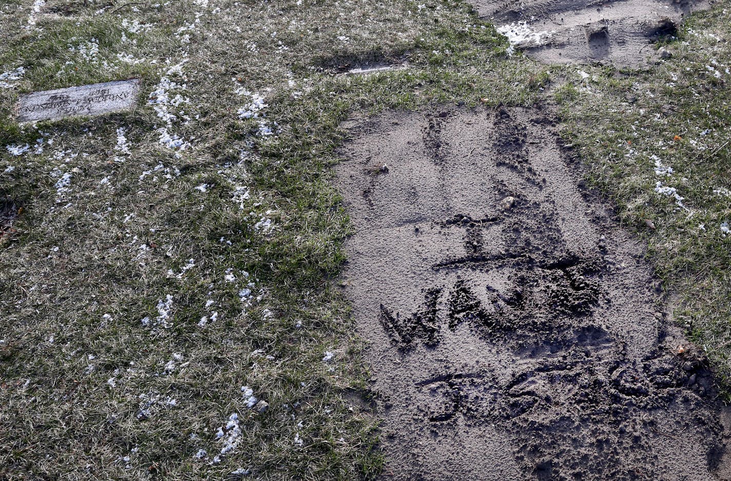 Jamar Clark's grave is yet unmarked, except for writing in the dirt that says "I want justice," in Crystal Lake Cemetery and seen Saturday, April 2, 2016, 2016, in Minneapolis, MN.](DAVID JOLES/STARTRIBUNE)djoles@startribune.com There is a reason archaeologists study graves to identify a culture&#xed;s social structure and inequities. Where and how our bodies go when we die often tells us about how we lived. Bones don&#xed;t lie. Jamar Clark&#xed;s grave is in north Minneapolis, just a few miles