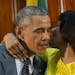 Jamaican Prime Minister Portia Simpson-Miller hugs President Barack Obama following the conclusion of their bilateral meeting at the Jamaica House, Th