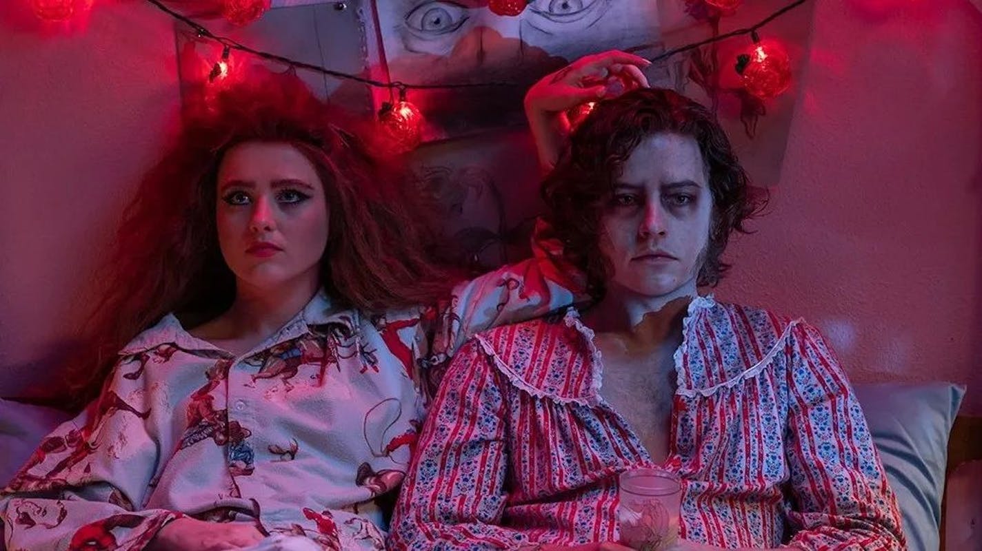 a woman and a man in bed in "Lisa Frankenstein"