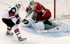 Anthony Duclair (10) got the puck past Wild goalie Devan Dubnyk (40) for a goal during the overtime shootout. Arizona beat Minnesota 2-1 in shootout.