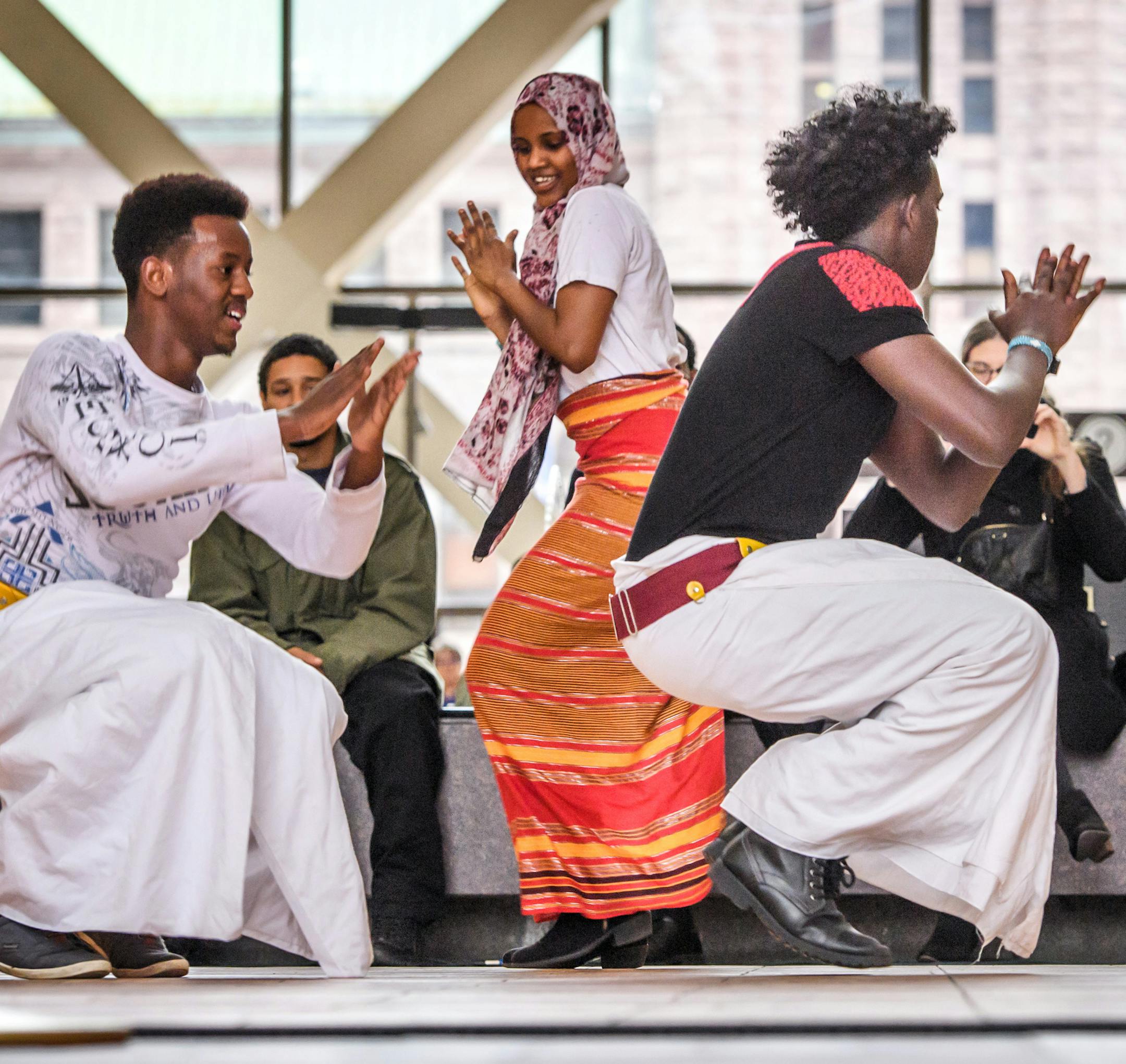 Members of the Somali Museum Dance Troupe performed a traditional dance at the Hennepin County Government Center Skyway Level Thursday afternoon. This is one of the only Somali dance ensembles in the United States. ] GLEN STUBBE * gstubbe@startribune.com Thursday, Dec 6, 2016 This performance was the kickoff to a display by the Somali Museum of Minnesota's titled Treasures from the Diaspora which will be on display at the Hennepin County Government Center through January 27. More info available