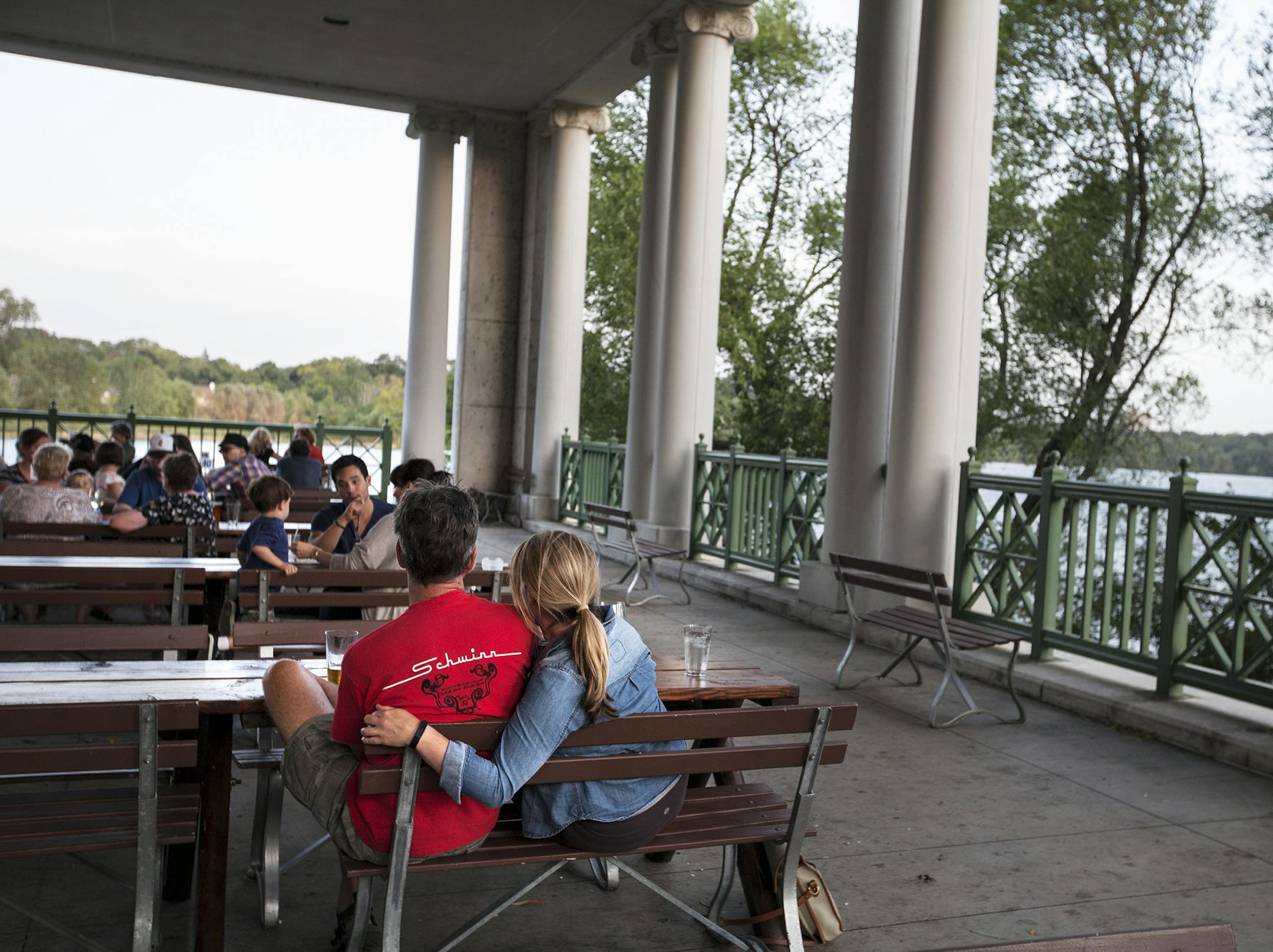 Mary Katherine O'Brien, right, and Thomas Bacheller of Minneapolis enjoy a drink at Como Dockside in St. Paul September 15, 2015. They usually go to an outdoor yoga class on the lake on Thursdays and then eat or have a drink afterwards at Como Dockside. (Courtney Perry/Special to the Star Tribune)