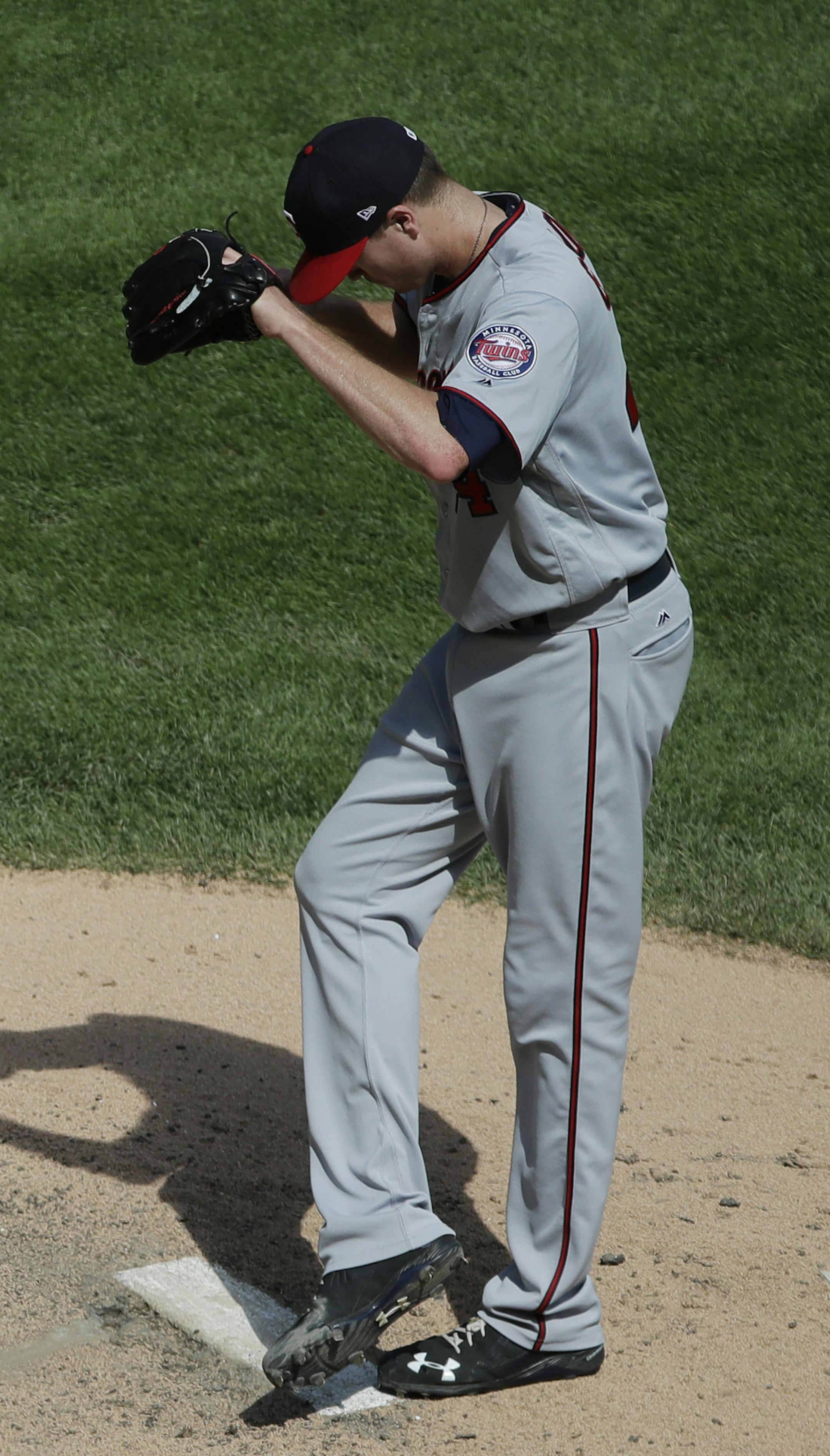 Minnesota Twins starting pitcher Kyle Gibson kicks the mound after Chicago White Sox's Adam Engel hit a two-run home run during the fifth inning of a baseball game Wednesday, Aug. 22, 2018, in Chicago. (AP Photo/Nam Y. Huh)