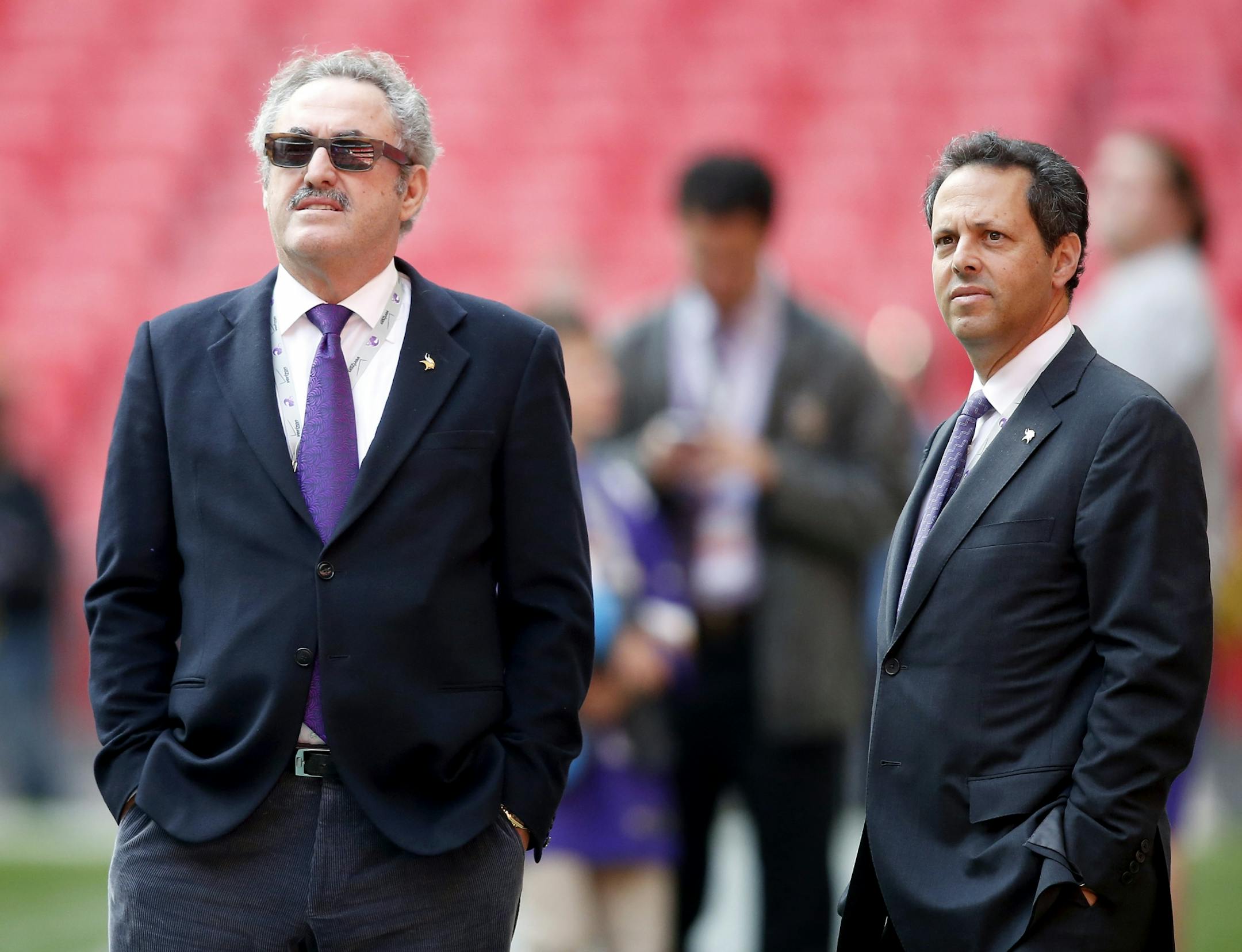 Minnesota Vikings owner Zygi and Mark Wilf stood on the field before a game between the Minnesota Vikings and Pittsburgh Steelers in London.
