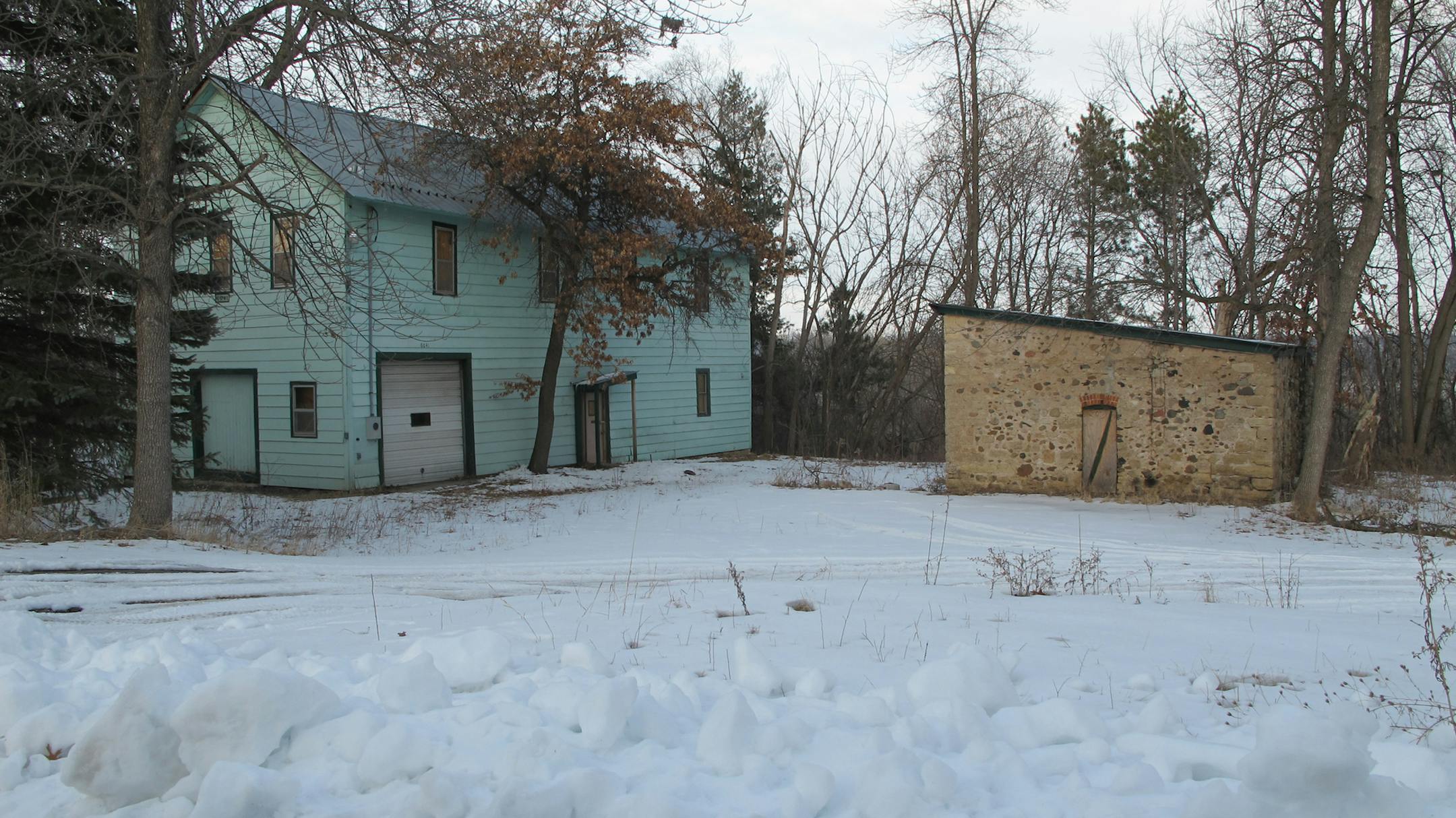 The Shoddy Mill and its stone warehouse are the last remaining structures in the abandoned Oak Park Heights neighborhood. They’re historic structures and, under the bridge plan, would be moved closer to Stillwater and preserved. Beginning in 1890 Jewish settlers Moritz and Bertha Bergstein operated a waste materials yard with the warehouse and “shoddy” mill, where waste fabric was recycled into stuffing for mattresses.