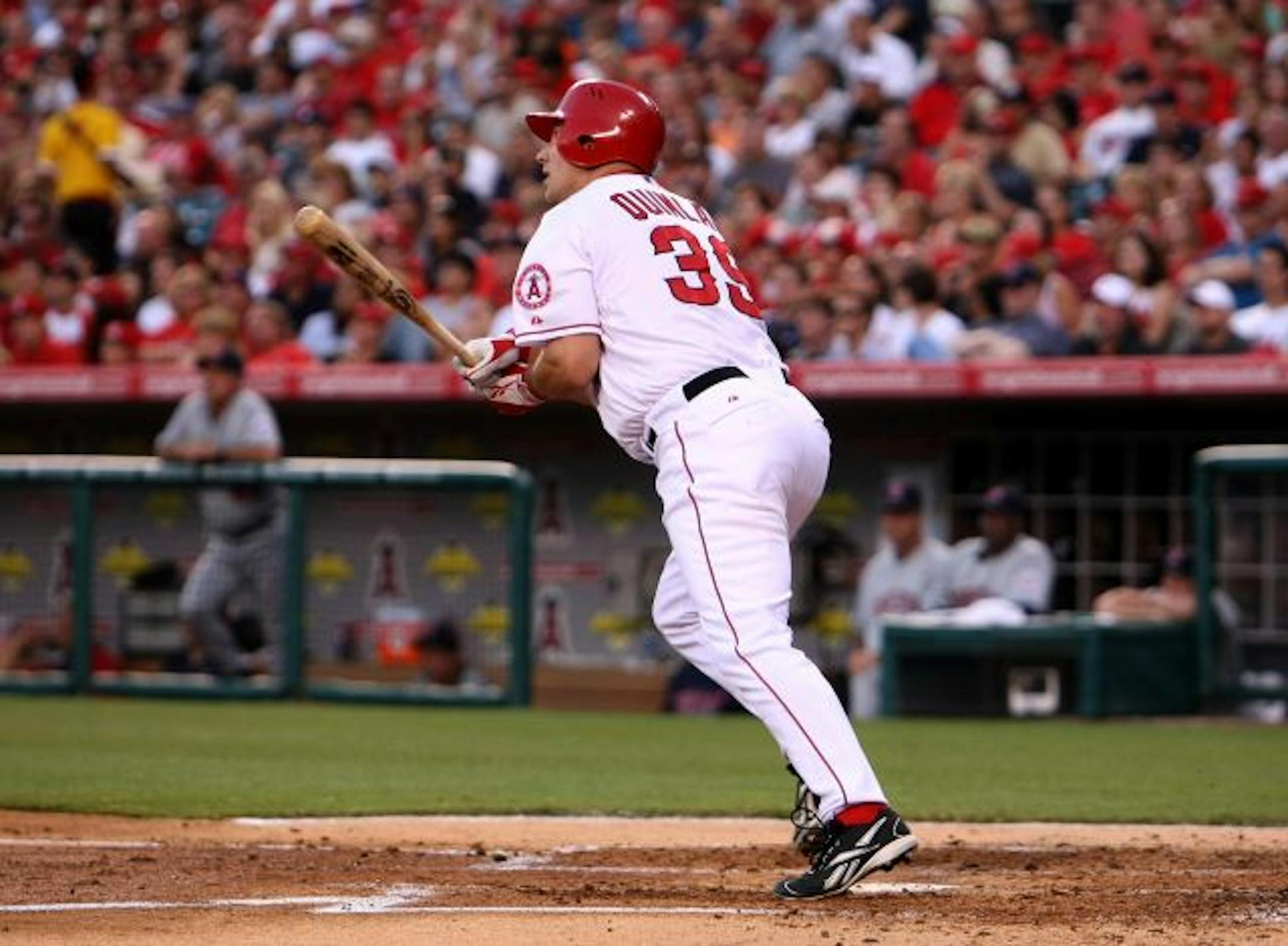 ANAHEIM, CA - JULY 24: Robb Quinlan #39 of the Los Angeles Angels of Anaheim hits a two-run home run in the second inning against the Minnesota Twins on July 24, 2009 at Angel Stadium in Anaheim, California.