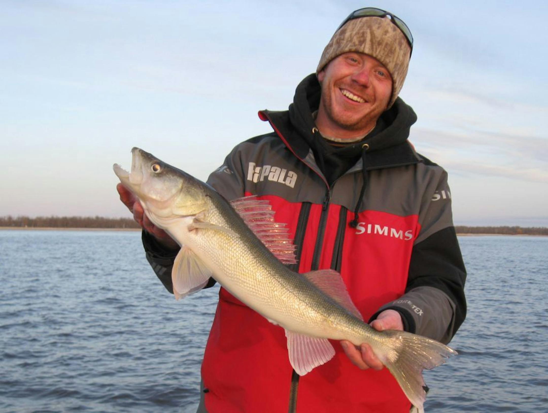 Adam Steinhilber of Excelsior with a 27-inch walleye he caught and released on Lake of the Woods.