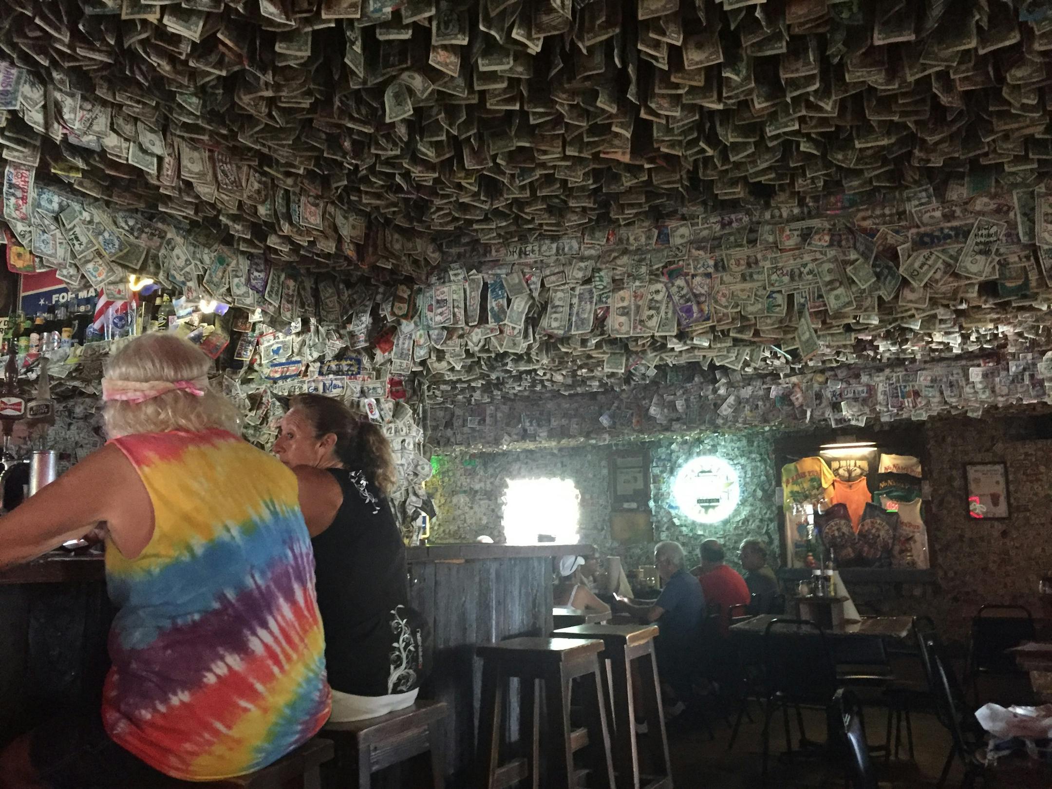 Dollar bills drip from the ceiling and cover the walls at No Name Pub in Big Pine Key, a good place to seek out for pizza, conch fritters and the chance to spot endangered Key deer. (Lori Rackl/Chicago Tribune/TNS) ORG XMIT: 1195876