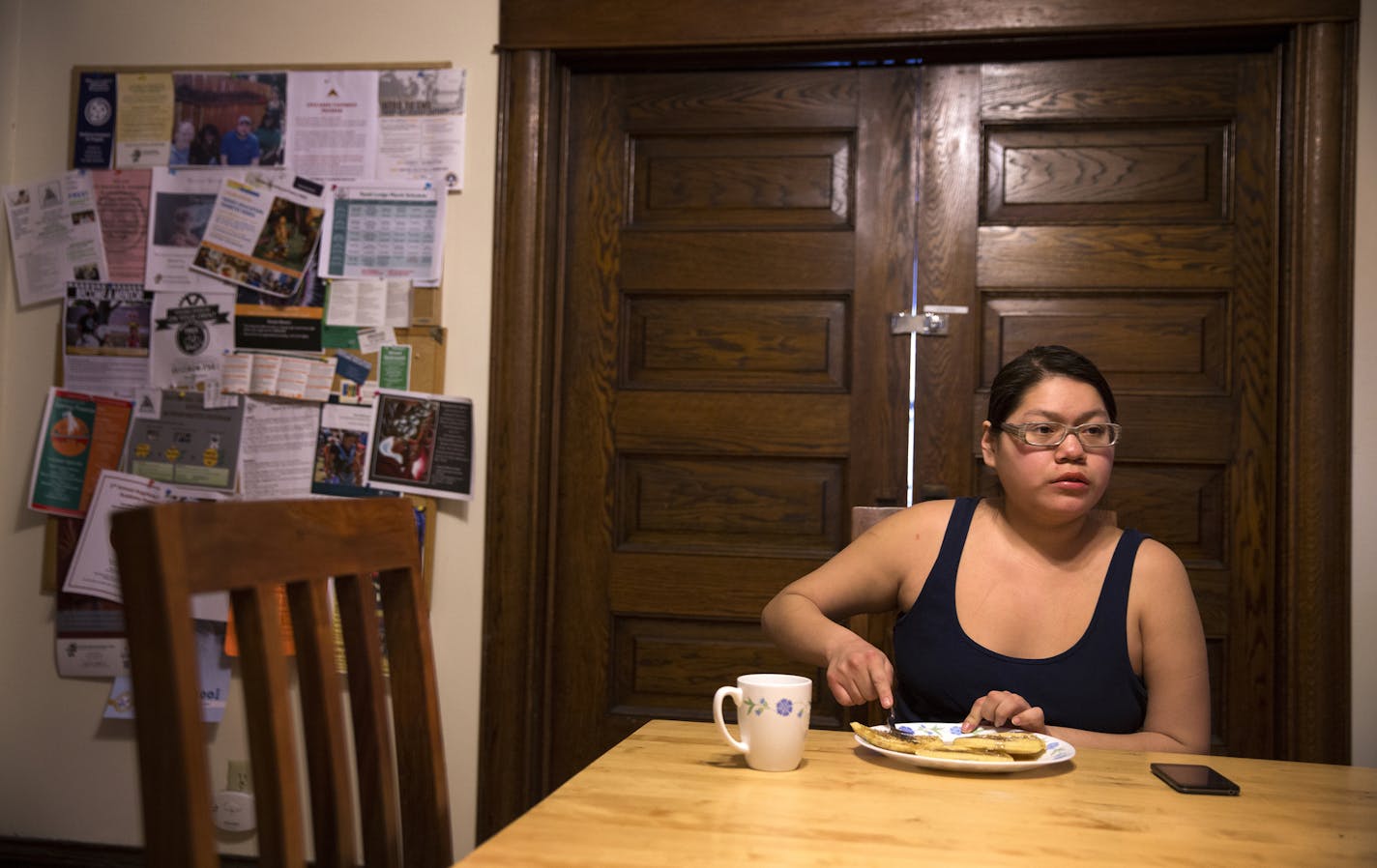 Rosalyn Feather eats breakfast at home in the Beverley A. Benjamin Youth Lodge in St. Paul on Monday, March 16, 2015. ] LEILA NAVIDI leila.navidi@startribune.com / BACKGROUND INFORMATION: Rosalyn Feather, who has been in the foster care system from ages 5 to 19, now lives in the Ain Dah Yung Center&#xed;s Beverley A. Benjamin Youth Lodge, which is transitional housing for Native American youth.