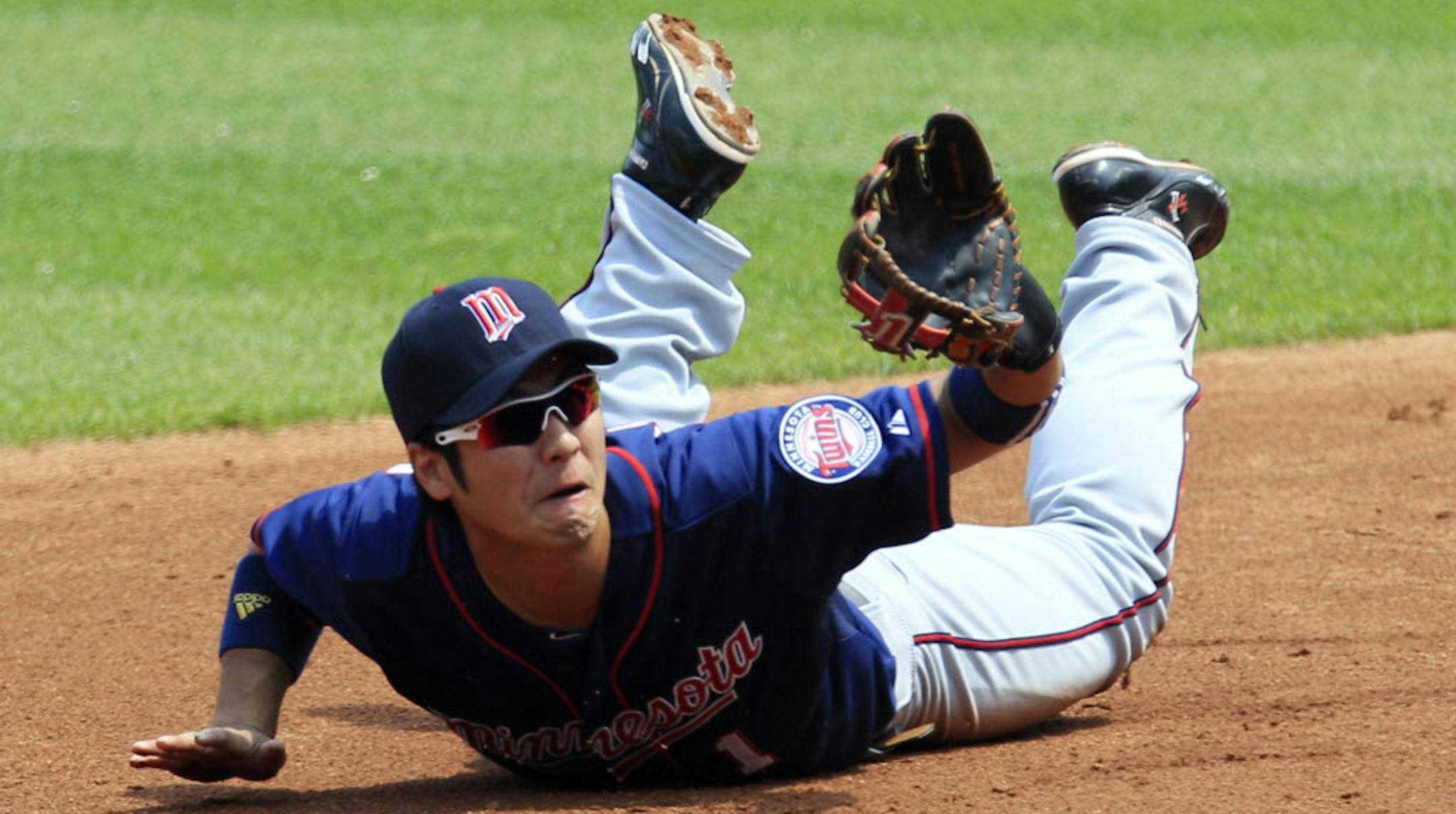Minnesota second baseman Tsuyoshi Nishioka looks up after an error in the second inning Wednesday.