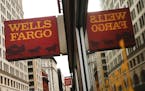 Wells Fargo rose Tuesday after Raymond James raised the stock's rating to outperform.