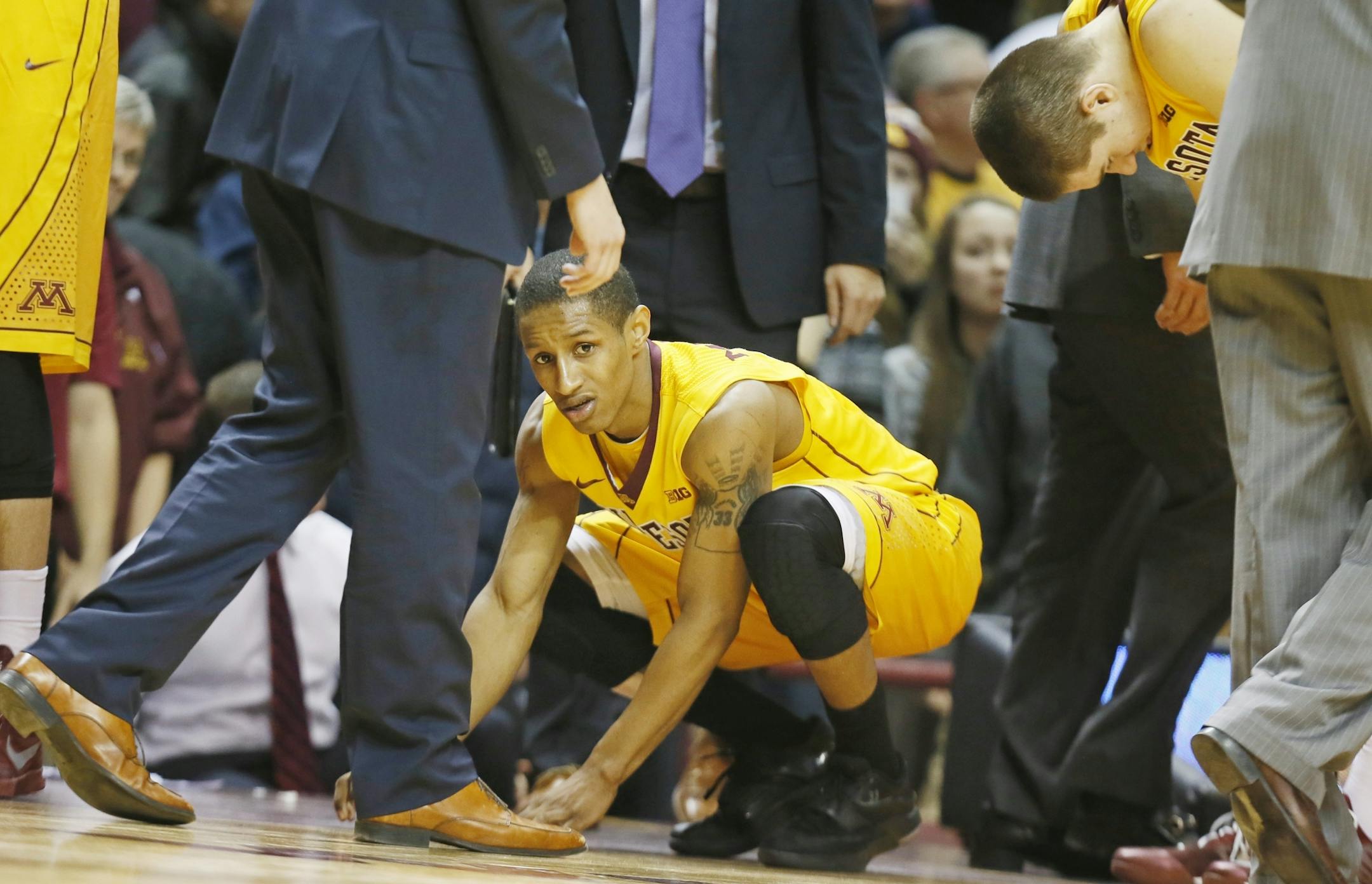 Minnesota Gophers guard DeAndre Mathieu (4) reacted after the officials review the last shot of game, and ruled time had expired Tuesday at Williams arena January 13, 2015 Minneapolis, MN.
