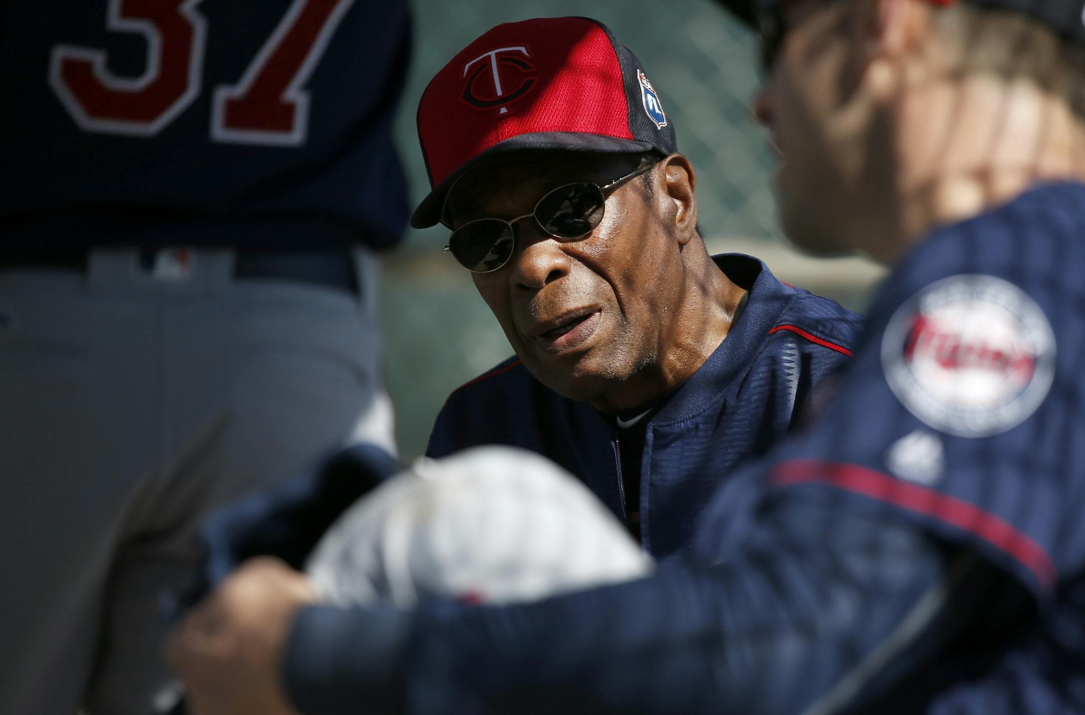 Rod Carew spoke with Minnesota Twins Joe Mauer during practice on Sunday.