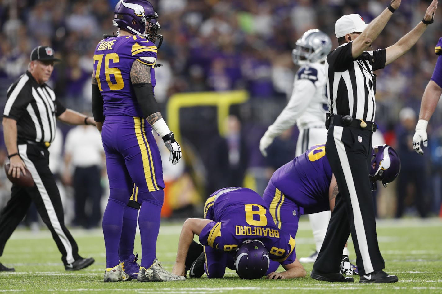 Minnesota Vikings quarterback Sam Bradford (8) was hurt on this play in the second quarter at U.S. Bank Stadium Thursday December 01,2016 in Minneapolis MN. The Minnesota Vikings hosted the Dallas Cowboys