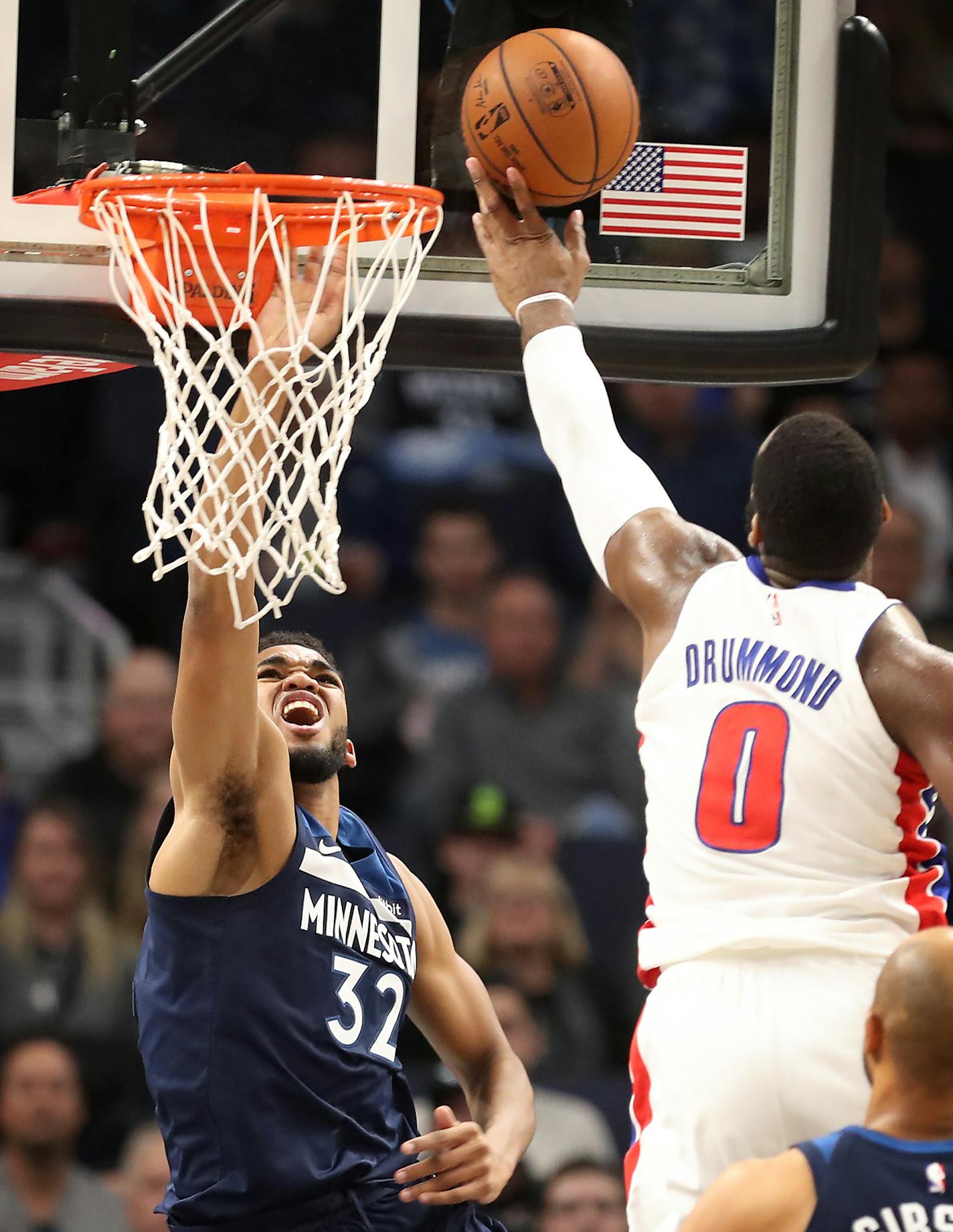 Detroit Pistons center Andre Drummond (0) shoots the ball as Minnesota Timberwolves center Karl-Anthony Towns (32) defends during the second half. ] LEILA NAVIDI &#xef; leila.navidi@startribune.com BACKGROUND INFORMATION: The Minnesota Timberwolves play against the Detroit Pistons at Target Center in Minneapolis on Sunday, November 19, 2017. The Detroit Pistons won 100-97.