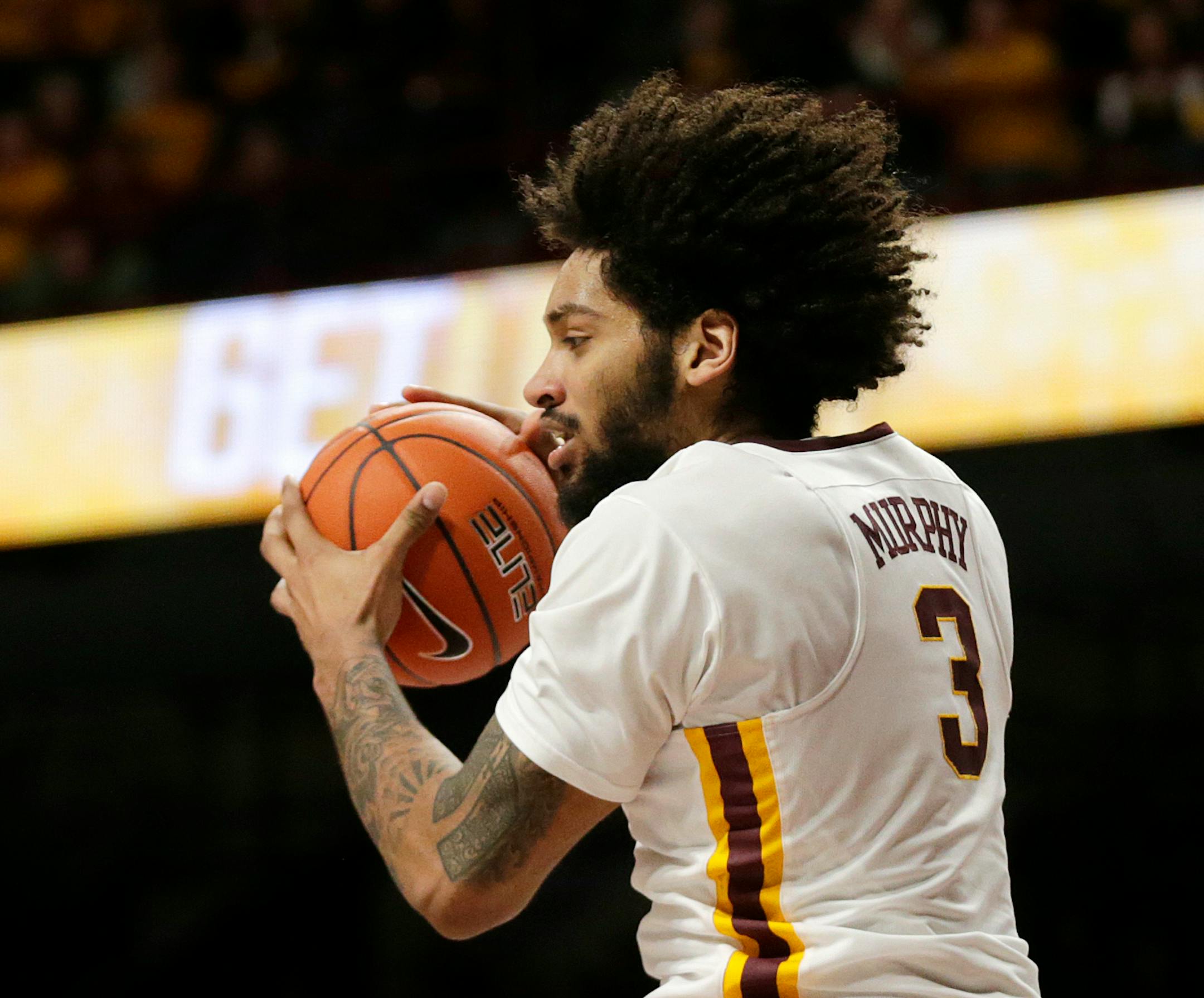 Minnesota forward Jordan Murphy (3) puts down a rebound against Rutgers during the second half of an NCAA college basketball game Saturday, Jan. 12, 2019, in Minneapolis. Minnesota defeated Rutgers 88-70. (AP Photo/Andy Clayton-King)