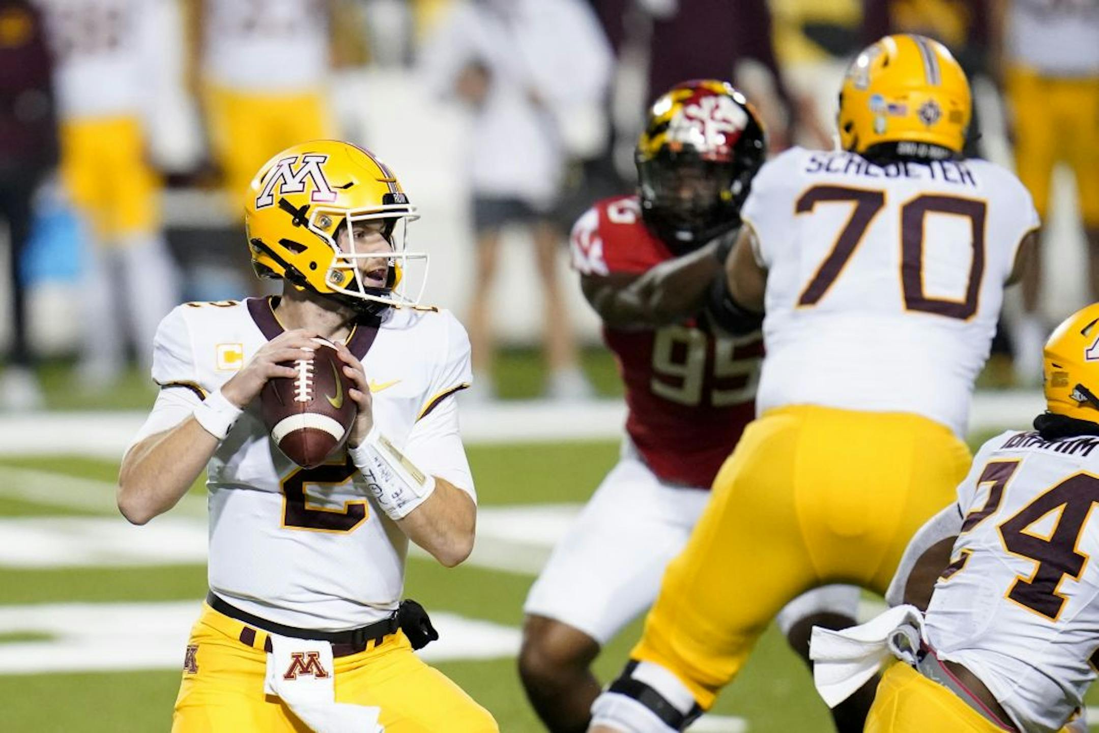 Minnesota quarterback Tanner Morgan looks to pass against Maryland.