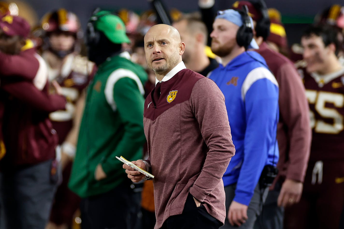 Minnesota head coach P. J. Fleck looks on against Syracuse during the second half of the Pinstripe Bowl NCAA college football game Thursday, Dec. 29, 2022, in New York. Minnesota won 28-20. (AP Photo/Adam Hunger)