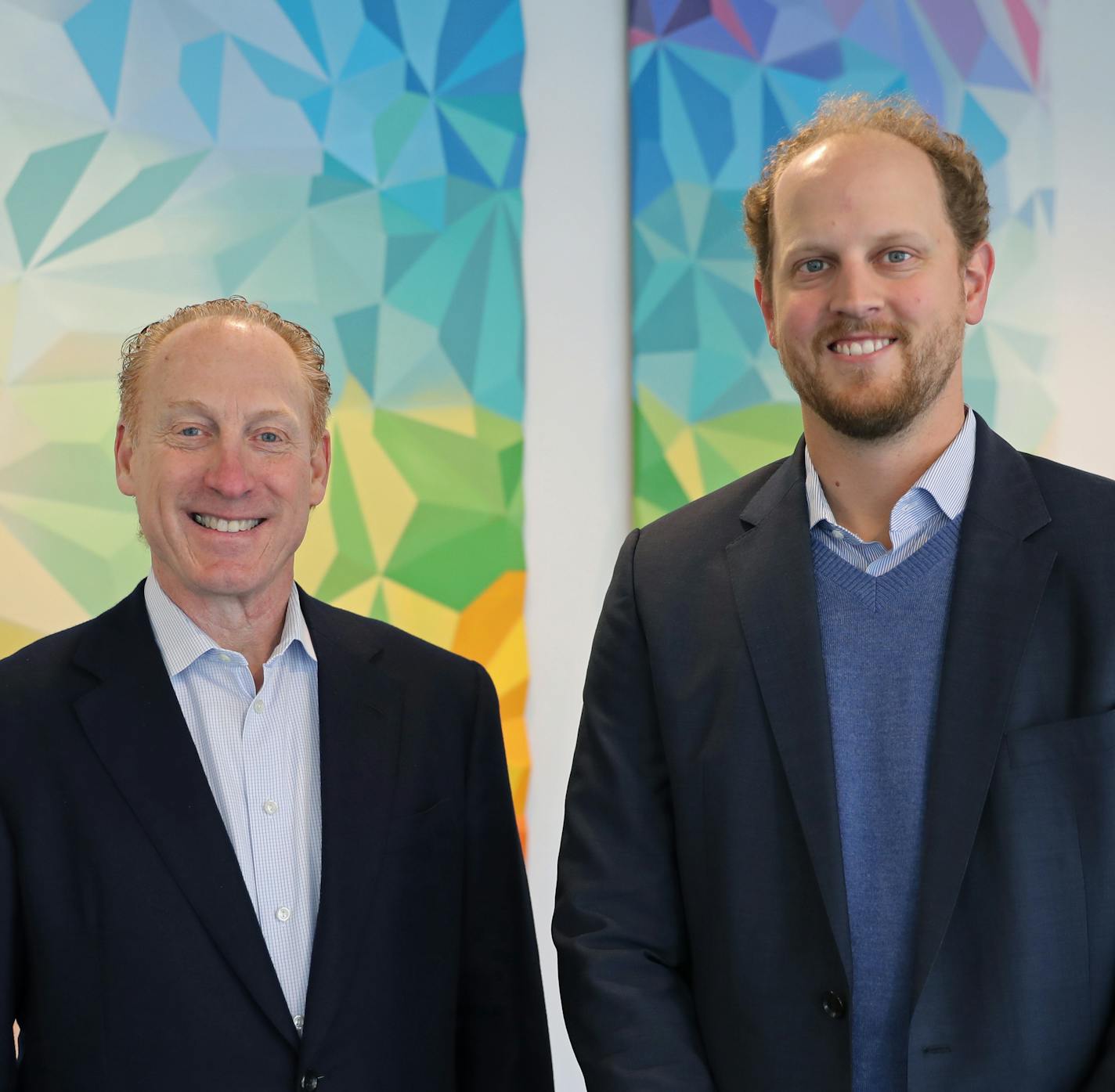 Chief Executive Officer Stuart Ackerberg (left) and Development Associate Marc Basara stood in front of an art installation inside the MoZaic East building in Uptown. ] Shari L. Gross &#x2022; shari.gross@startribune.com The MoZaic East building in Uptown is slated for completion this month. It's one of the few speculative office buildings that has been built in the last two years. Tour of the new MoZaic East office building in Uptown with Stu Ackerberg, head of the Ackerberg Group, on Wednesday