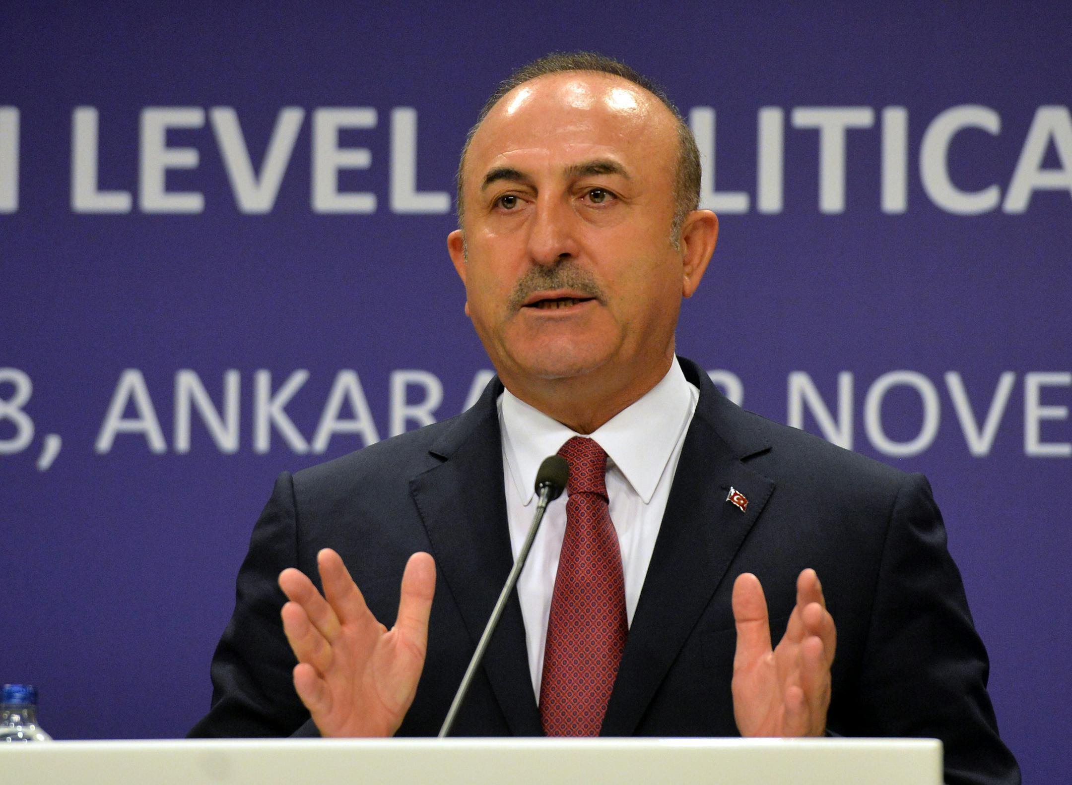 Turkish Foreign Minister Mevlut Cavusoglu speaks in a joint press conference with the European Union's High Representative for Foreign Affairs and Security Policy Federica Mogherini and Johannes Hahn, commissioner for European Neighborhood Policy and Enlargement Negotiations, in Ankara, Turkey, Nov. 22, 2018. (Xinhua/Mustafa Kaya/Sipa USA/TNS)