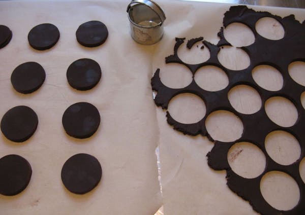 Cut the chocolate cookie dough with a 2- or 3-inch round cookie cutter -- or even smaller.
