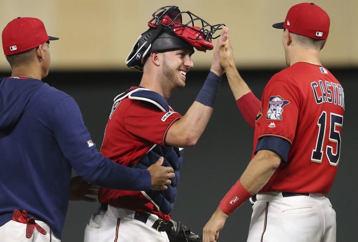 Jason Castro congratulated fellow catcher Mitch Garver after a game earlier this season.