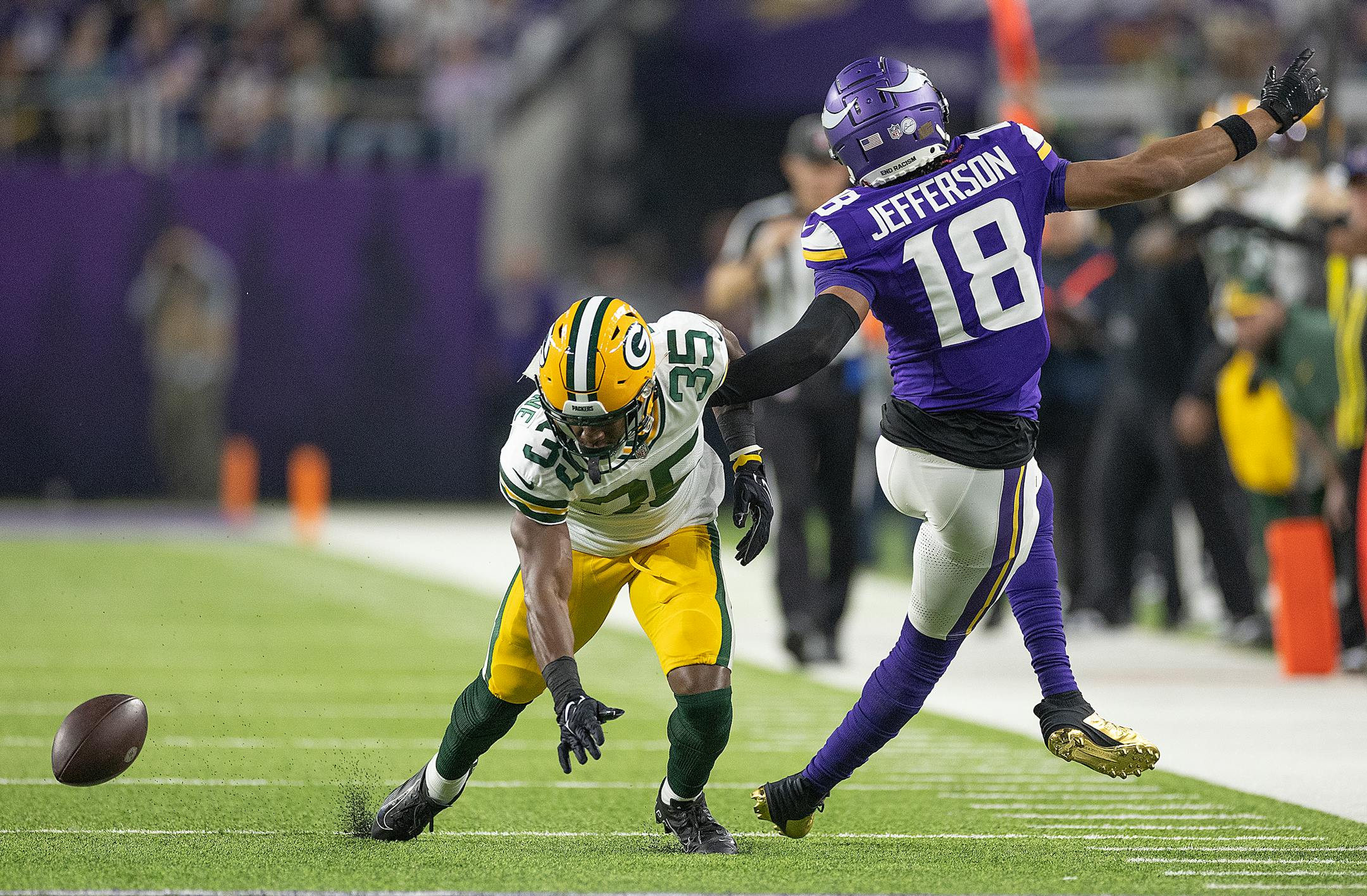 Packers cornerback Corey Ballentine (35) breaks up a pass intended for Vikings wide receiver Justin Jefferson (18) in the first quarter at U.S. Bank Stadium, in Minneapolis, Minn., on Sunday, Dec. 31, 2023. ] Elizabeth Flores • liz.flores@startribune.com