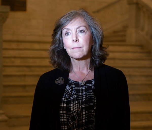 Nancy Dunlap, shown at Minneapolis City Hall in December, is an investigator for the Hennepin County Attorney's Office.