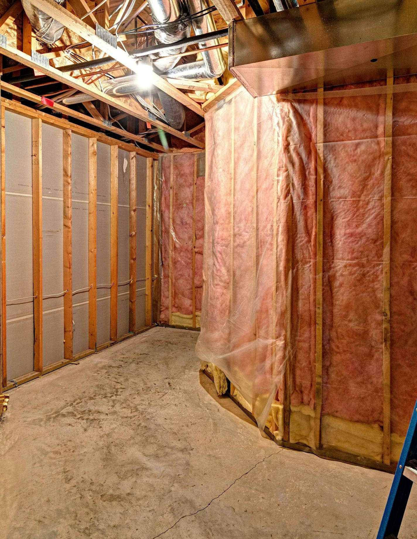 Before: Unfinished basement, before it was transformed into a wine cellar