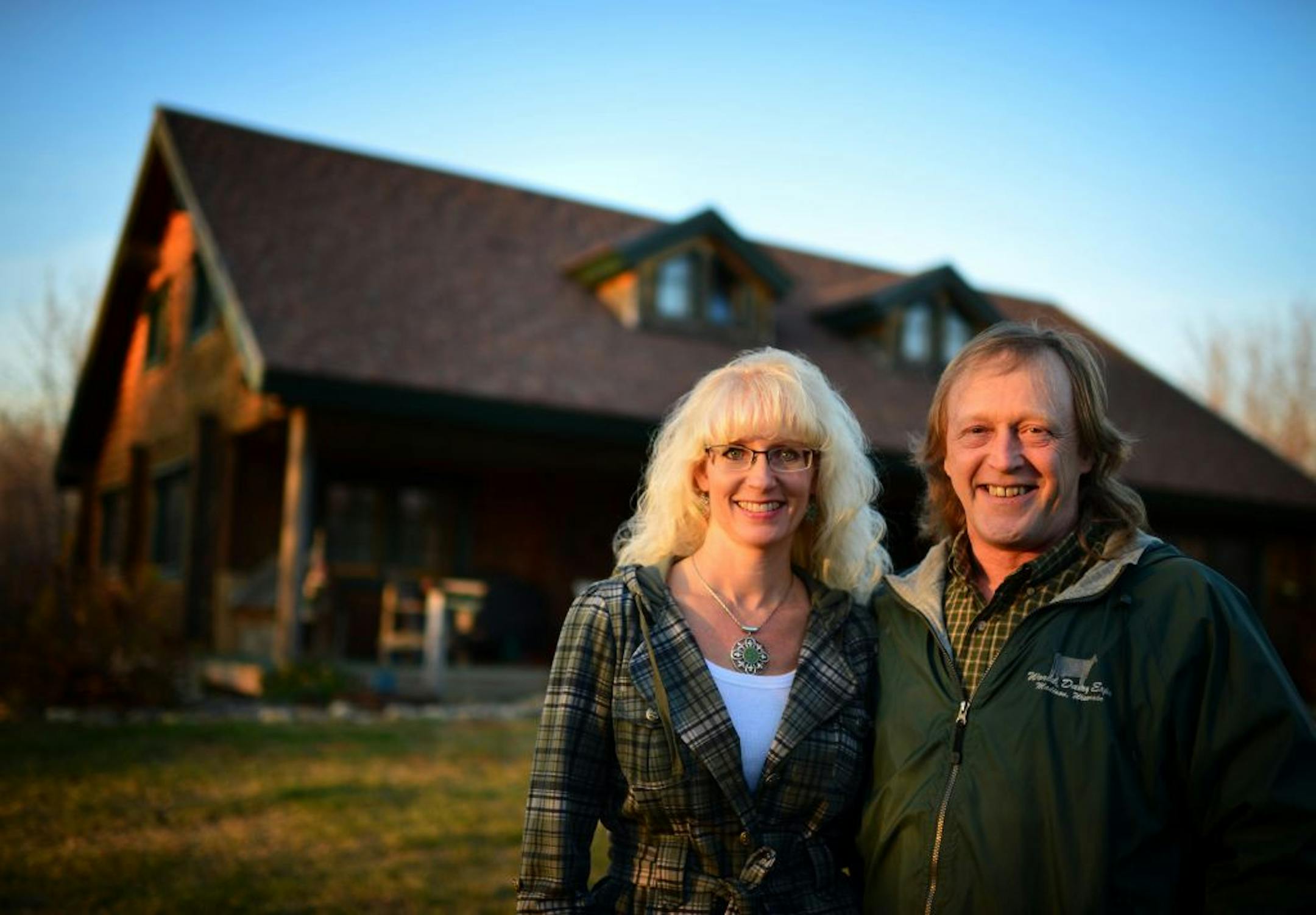 Kris and Kevin Brown who were evicted from this home 10 years ago and had to battle to get it back. Thursday, November 8, 2012.