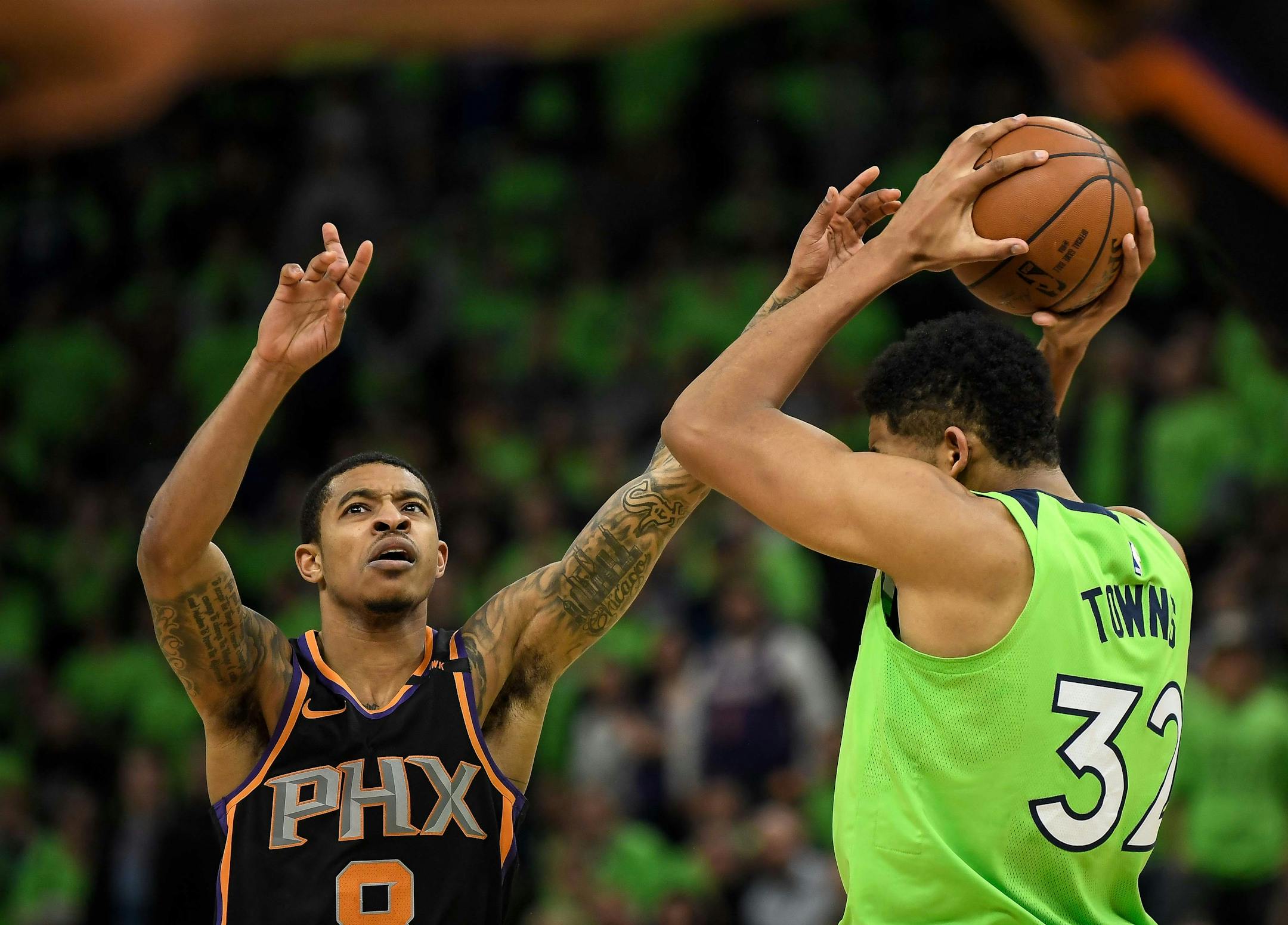 Phoenix Suns guard Tyler Ulis (8) appeared to dislocate a finger while guarding Minnesota Timberwolves center Karl-Anthony Towns (32) in the fourth quarter. ] AARON LAVINSKY ï aaron.lavinsky@startribune.com The Minnesota Timberwolves played the Phoenix Suns on Saturday, Dec. 16, 2017 at Target Center in Minneapolis, Minn.