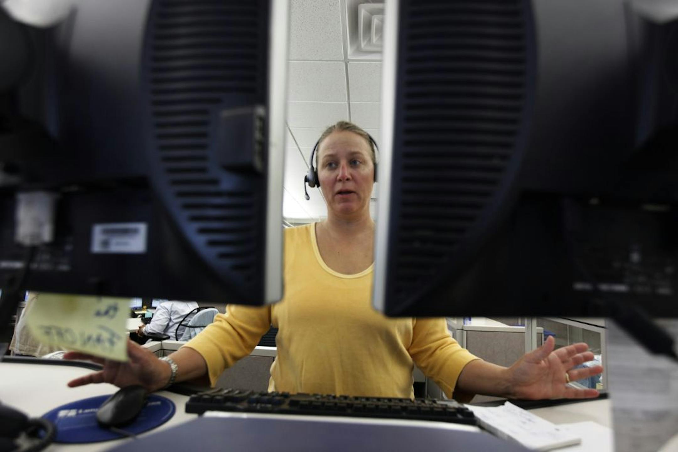 Nancy McGrath a 311 customer service agent took a a cal from a Minneapolis resident. Minneapolis resident can call 311 for non-life-threatening emergencies, such as vehicle break-ins, vandalism, theft, and lost property.