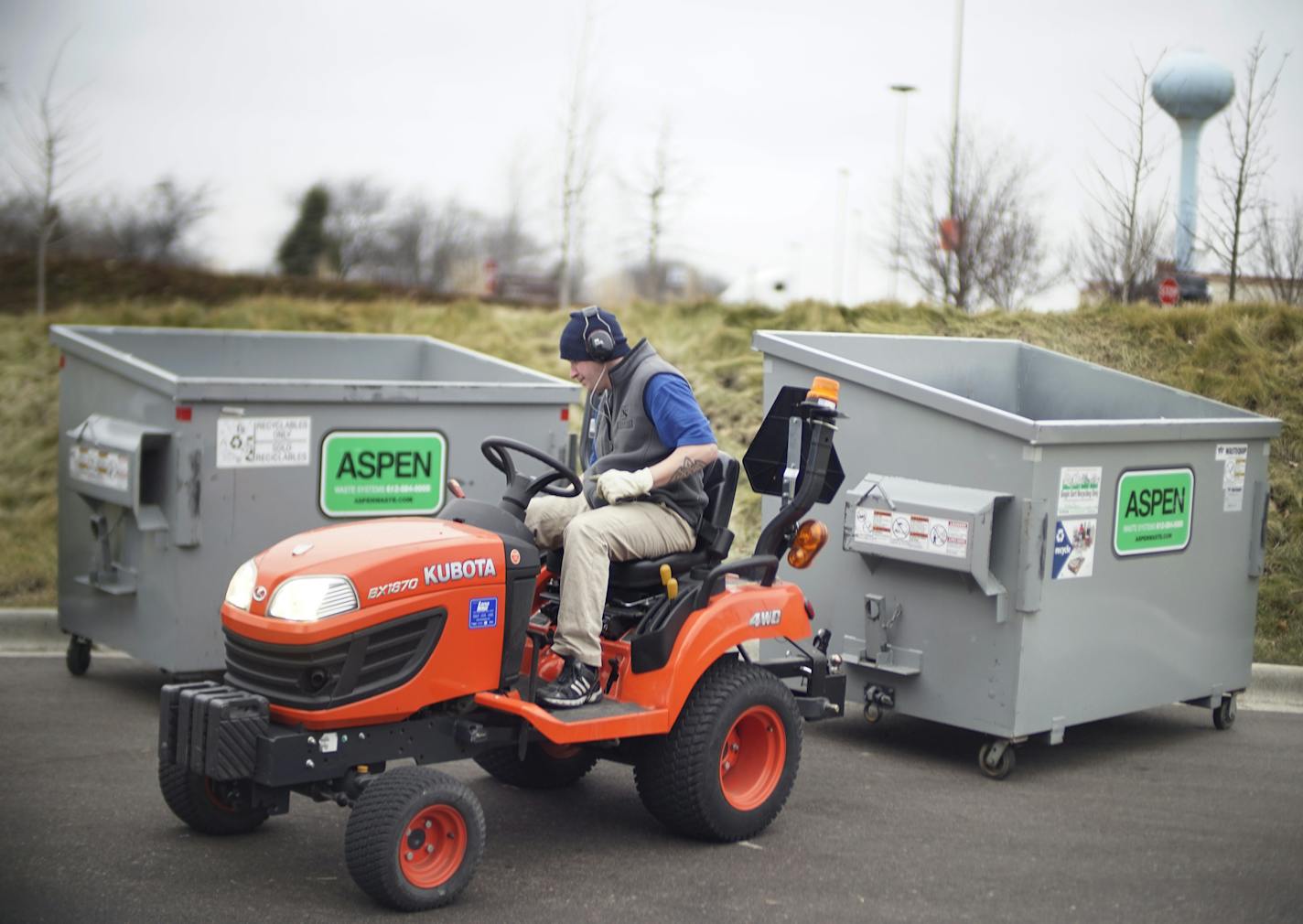 Bobby Johnson drove around two recycling bins while completing chores at One South Place.