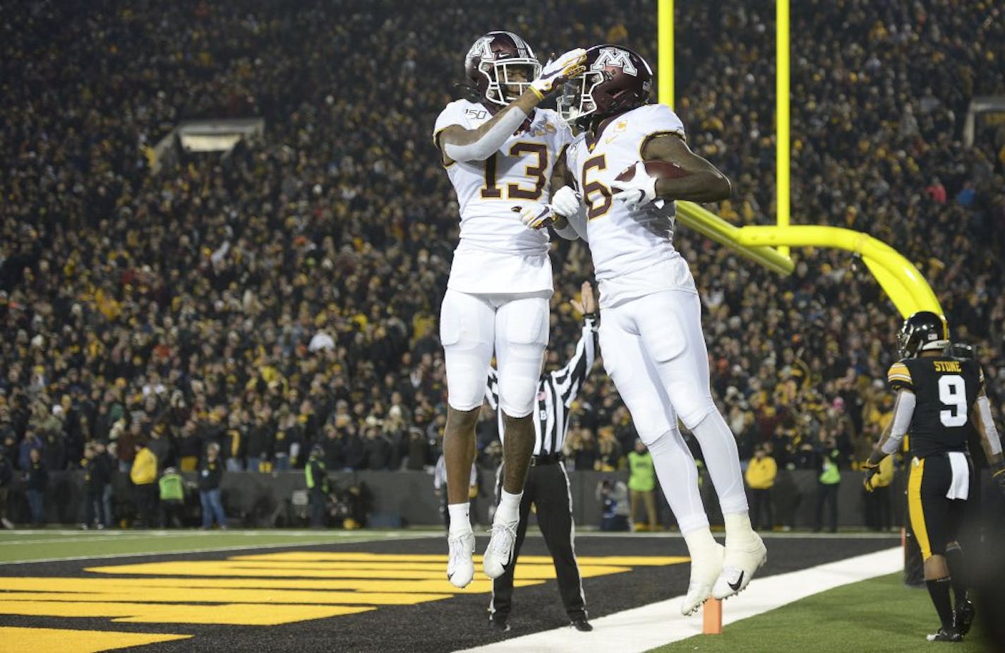 Minnesota Gophers wide receiver Tyler Johnson (6) and wide receiver Rashod Bateman (13) celebrated Johnson's third quarter touchdown pass against the Iowa Hawkeyes.