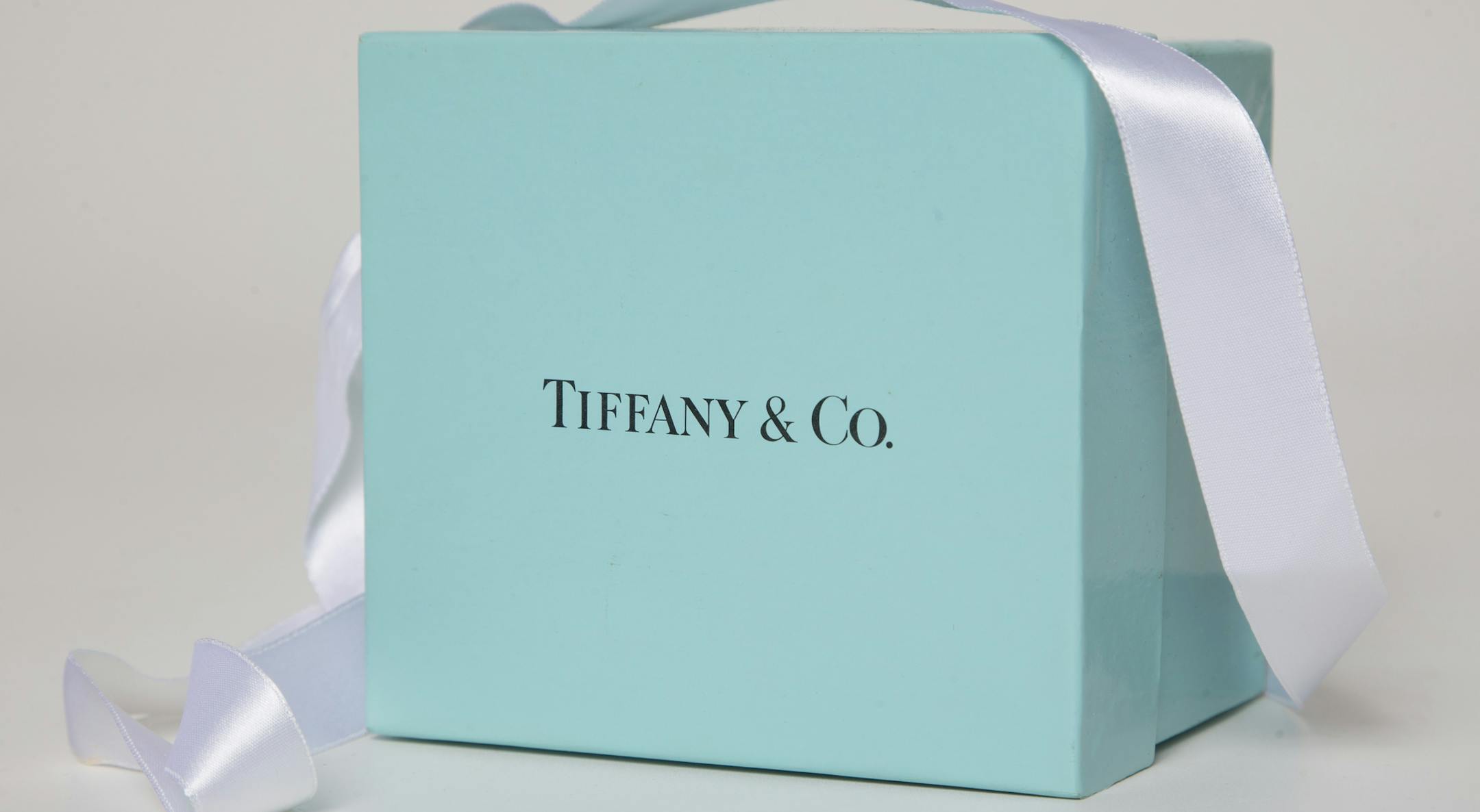 In this Monday, May 22, 2017, photo, a gift box from Tiffany & Co. is arranged for a photo in Surfside, Fla. Tiffany & Co. reports earnings, Wednesday, May 24, 2017. (AP Photo/Wilfredo Lee)