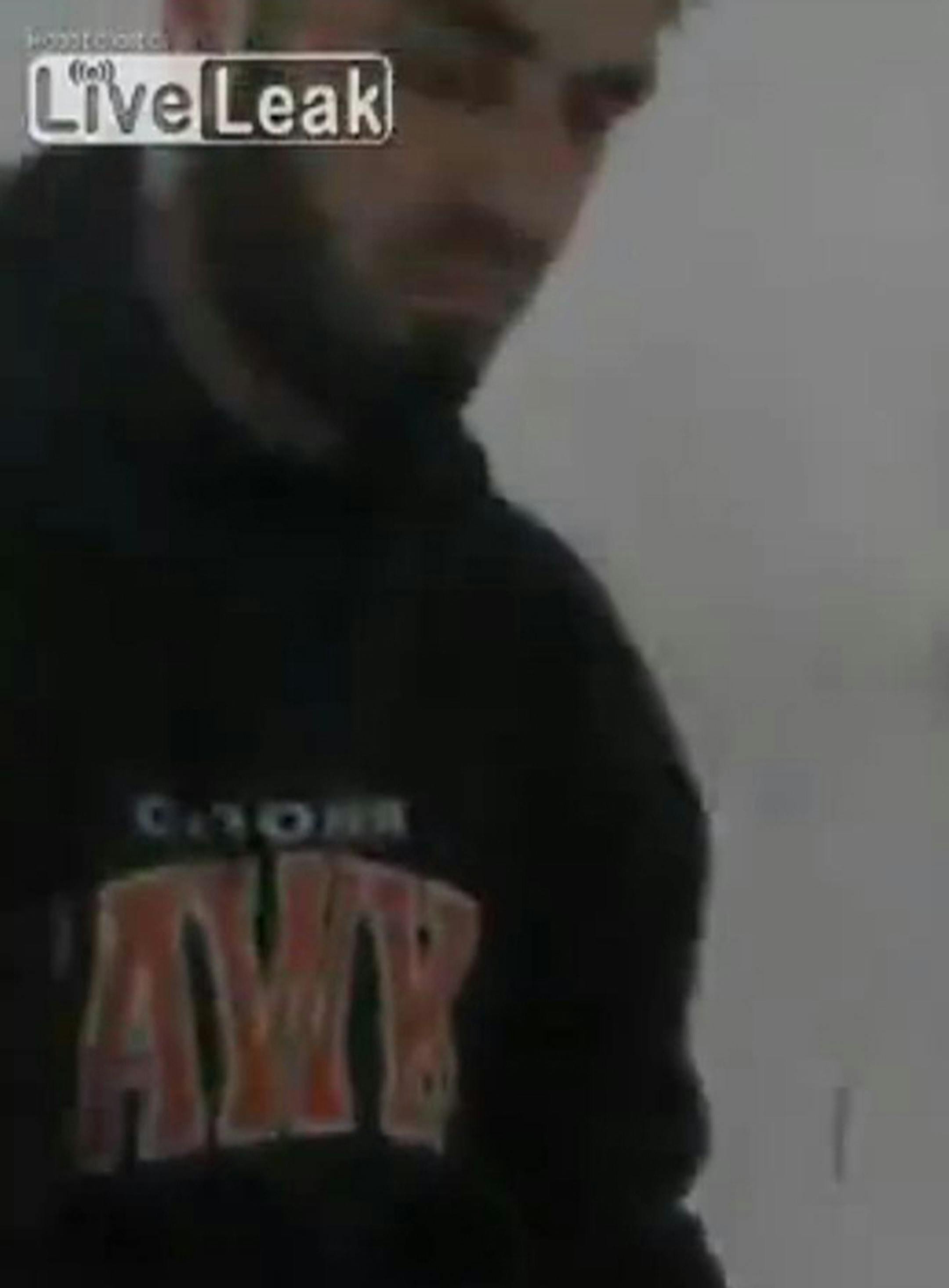 This Syrian sniper recorded in a video has an interesting choice of work clothing, namely a Robbinsdale Cooper High School sweatshirt.