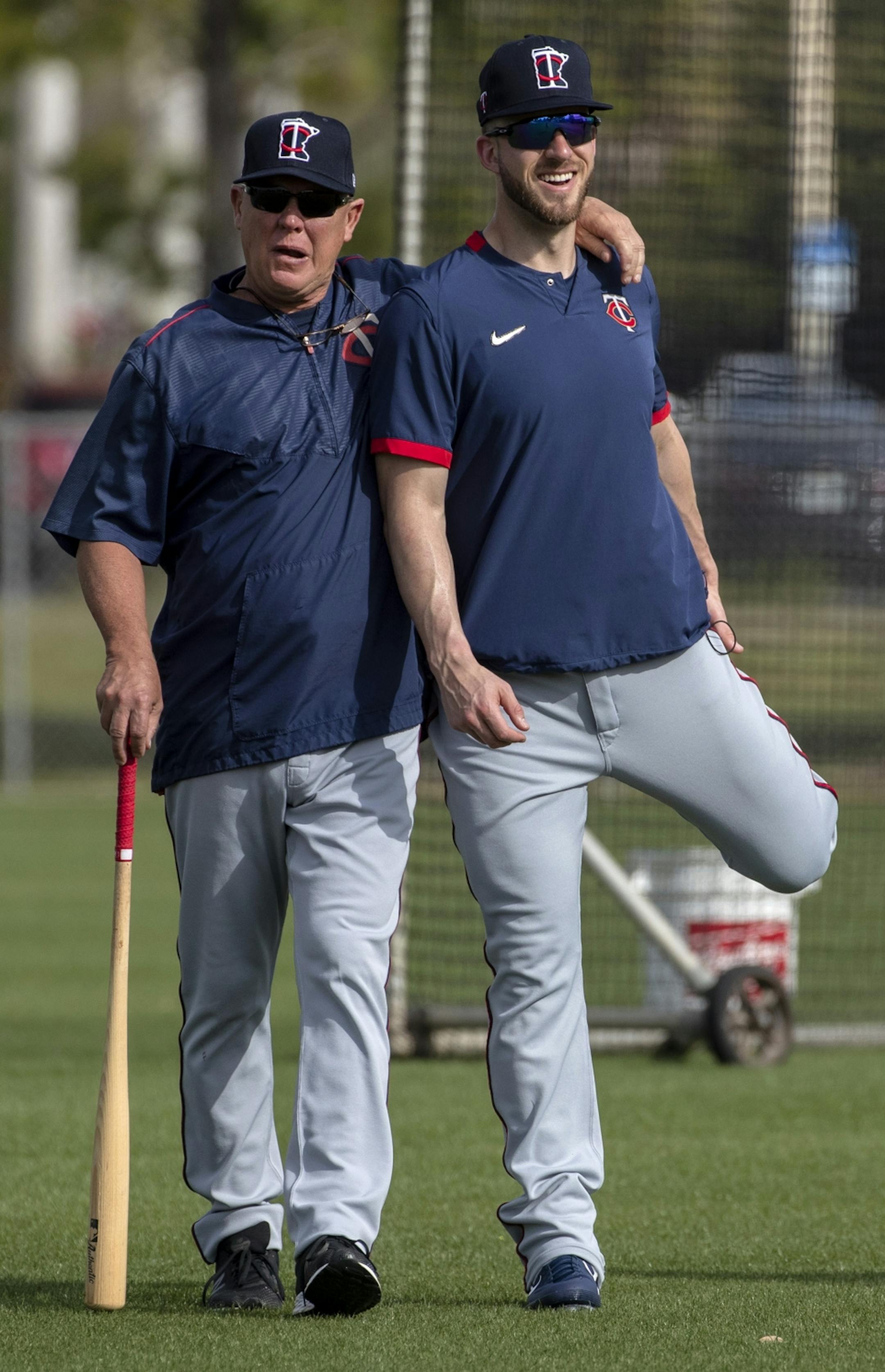 Minnesota Twins catcher Mitch Garver (right) stretched out during practice on Friday.