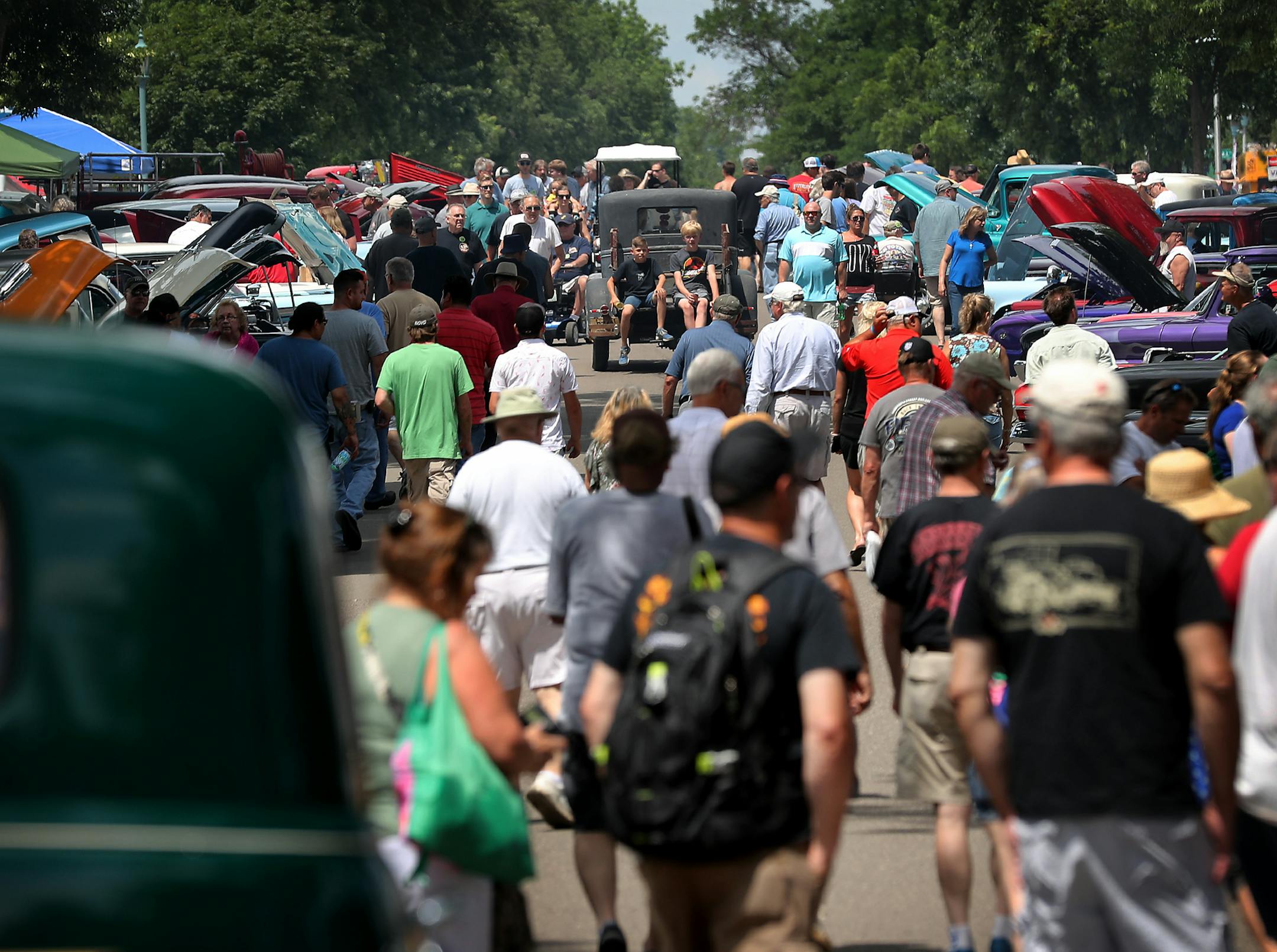 Thousands of street rods, customs and restored vehicles filled the grounds of the Minnesota State Fairgrounds during the Minnesota Street Rod Association's 45th annual Back to the Fifties Weekend and seen Friday, June 22, 2018, in Falcon Heights, MN. Here, huge crowds took in the event.] DAVID JOLES ï david.joles@startribune.com Minnesota Street Rod Association's 45th annual Back to the Fifties Weekend at the Minnesota State Fairgrounds.
