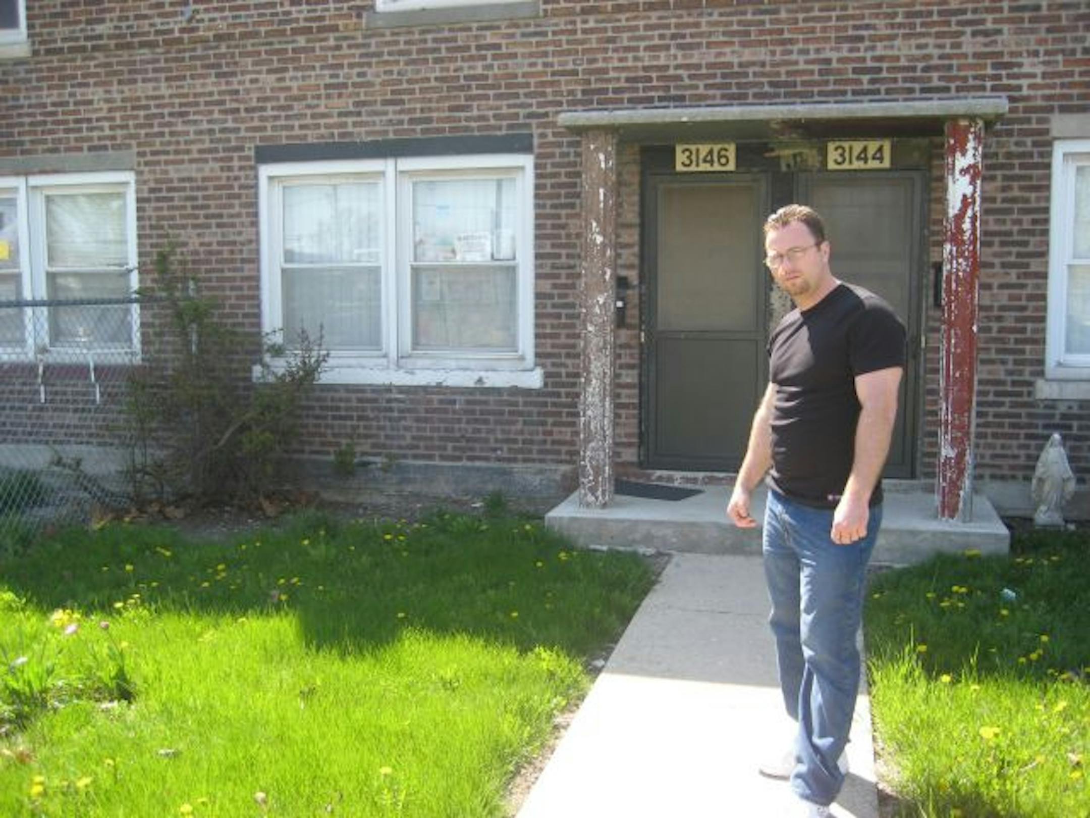 Art Williams in front of the old Bridgeport Homes apartment from the book The Art of Making Money