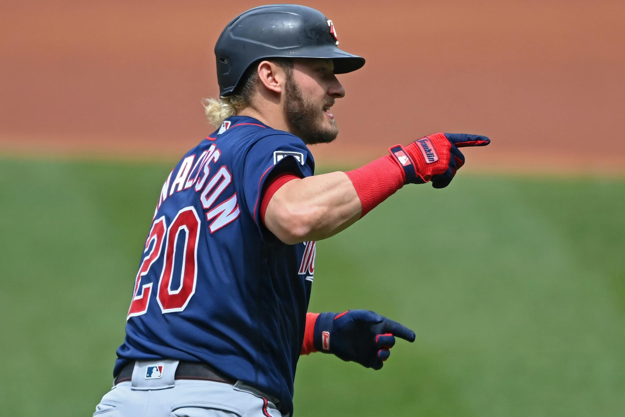 Minnesota Twins' Josh Donaldson (20) runs the bases after hitting a solo home run off Cleveland Indians starting pitcher Logan Allen in the first inning of a baseball game, Wednesday, April 28, 2021, in Cleveland. (AP Photo/David Dermer)