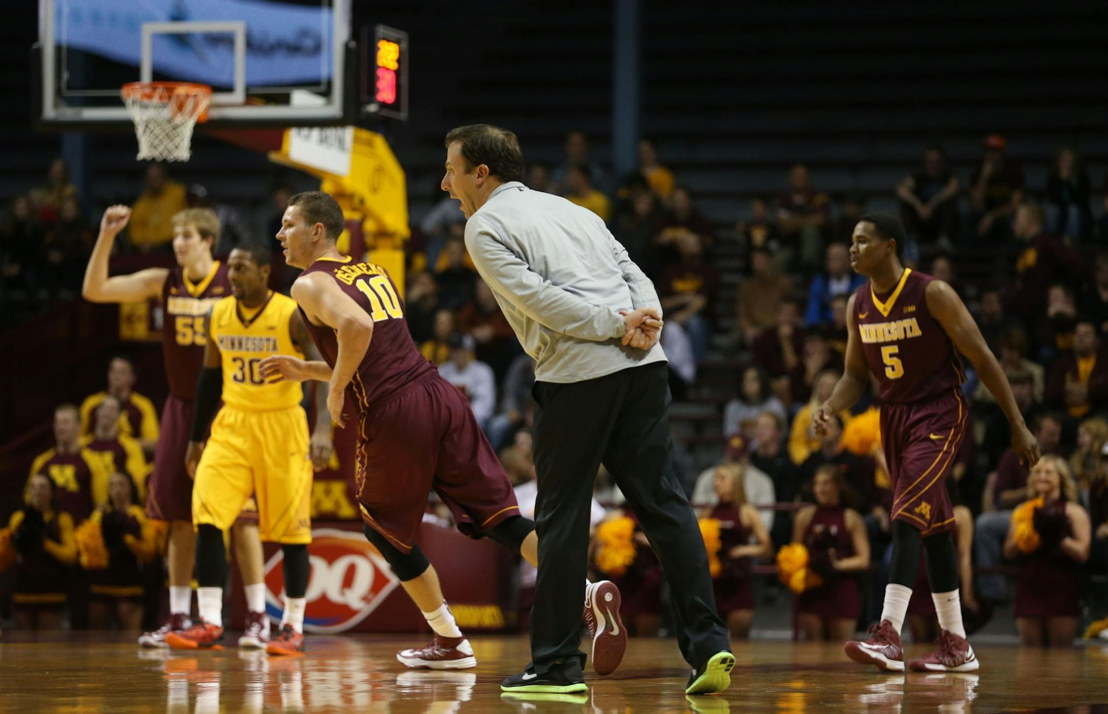 Gopher head coach Richard Pitino yelled instructions to both teams as he walked the sidelines during the first half of the Gopher's scrimmage at Williams Arena in Minneapolis Min., Friday, October 18, 2013.