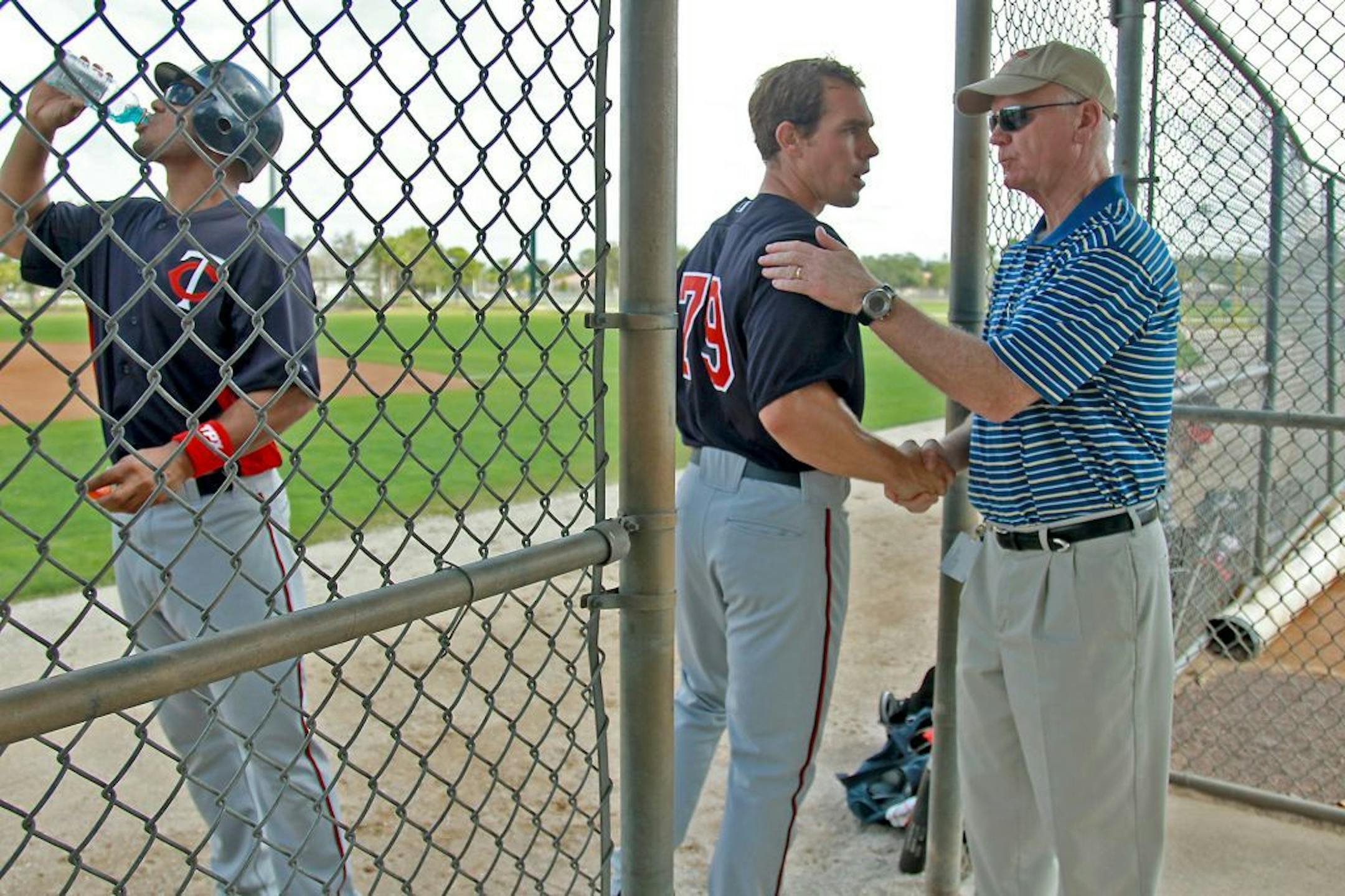 Minnesota Twins GM Terry Ryan greeted Matt Carson during spring training.
