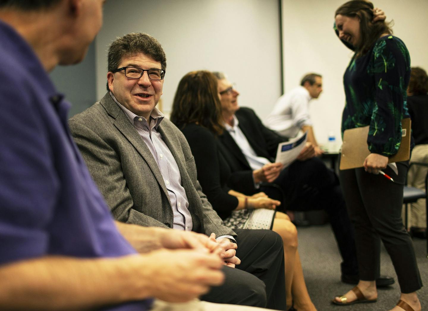 Chuck Blatt, left, of Chicago, Ill. meets Monday, June 25, 2018 with other job-seekers during a networking and support group for executives that meets Monday mornings at JVS, a career counseling center in Skokie. Blatt, 50, is seeking employment through a variety of online recruitment tools as well as networking and traditional, face-to-face interviews. (Chris Walker/Chicago Tribune/TNS) ORG XMIT: 1236183