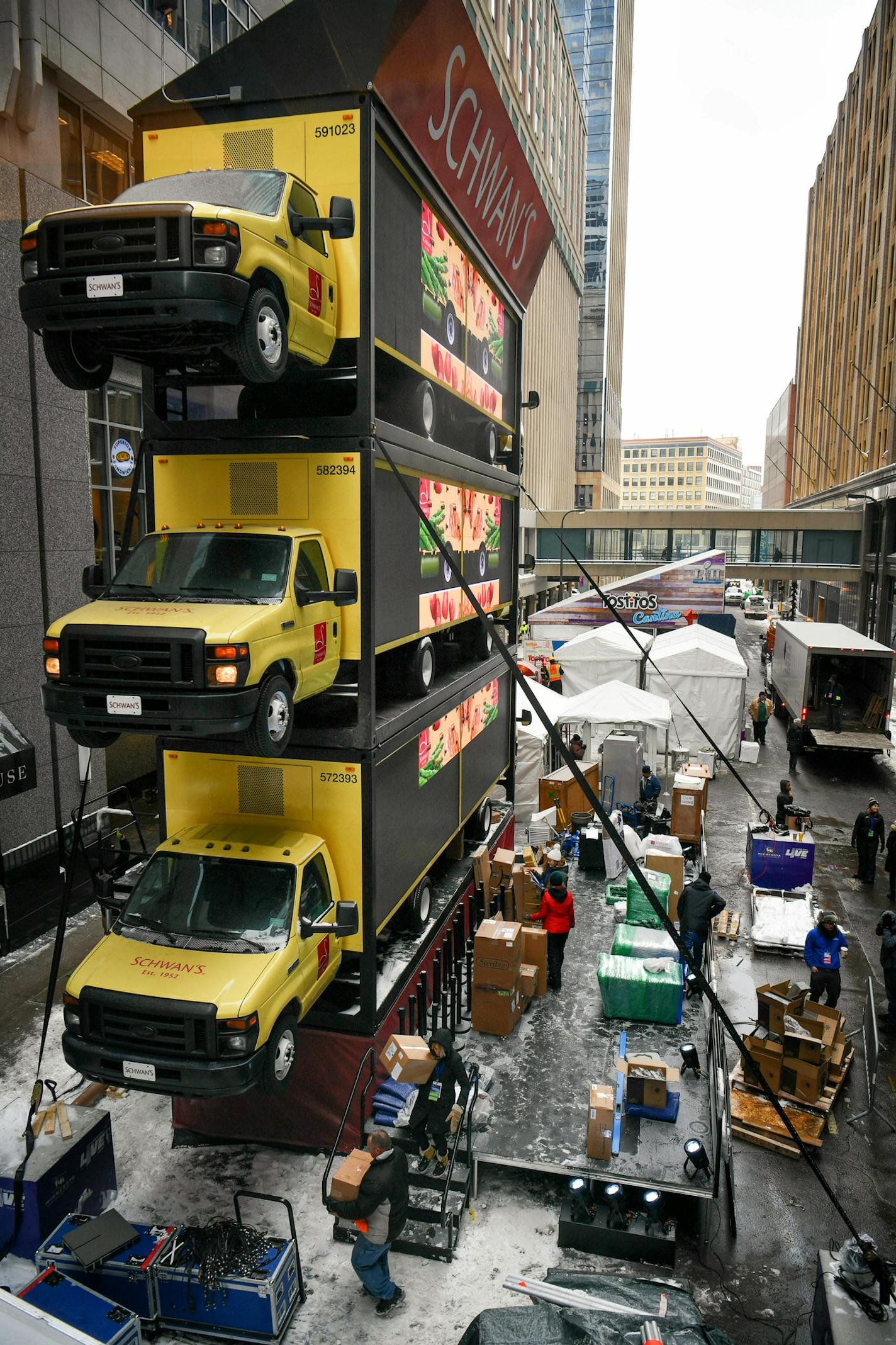 Trucks stacked three high at the Schwans display on Nicollet Mall. ] GLEN STUBBE &#x2022; glen.stubbe@startribune.com Wednesday, January 24, 2018 Corporate presence on Nicollet Mall as they finish up work on getting it ready for Super Bowl Live, which officially kicks off Friday afternoon.