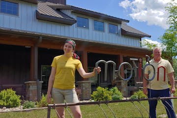 Art coordinator Lily Brutger, left, and owner Greg Konsor at Art in Motion, an art gallery, cafe and community space in Holdingford, Minn.