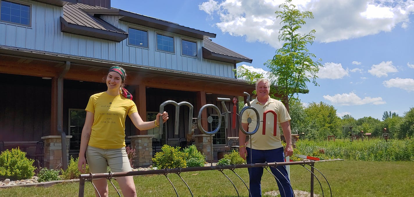 Art coordinator Lily Brutger, left, and owner Greg Konsor at Art in Motion, an art gallery, cafe and community space in Holdingford, Minn.